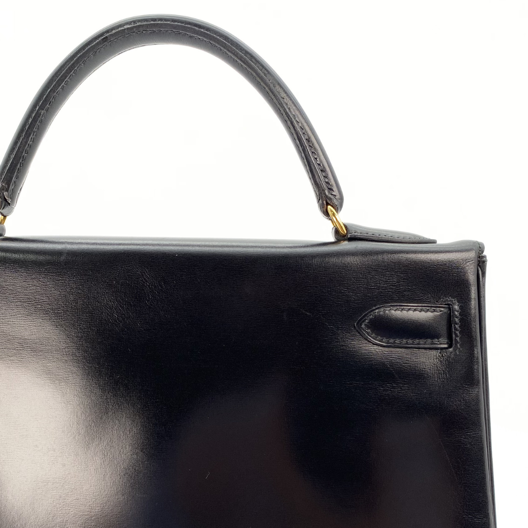 Malin, 1966 Kely 32 Retourne Black Boxcalf with stamp V