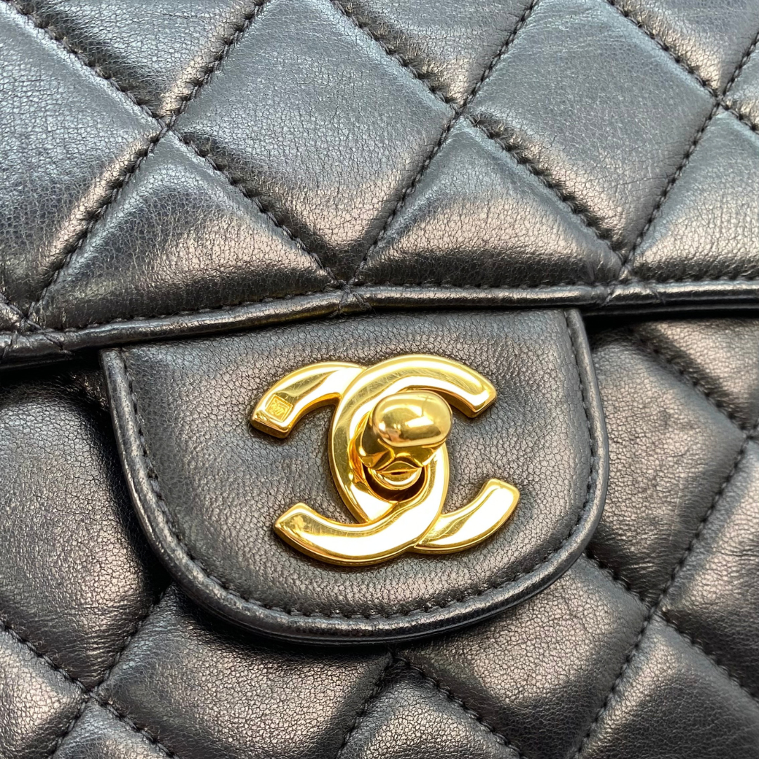 Eito, 4 Series Medium Single Flap Black Lambskin with seal and card