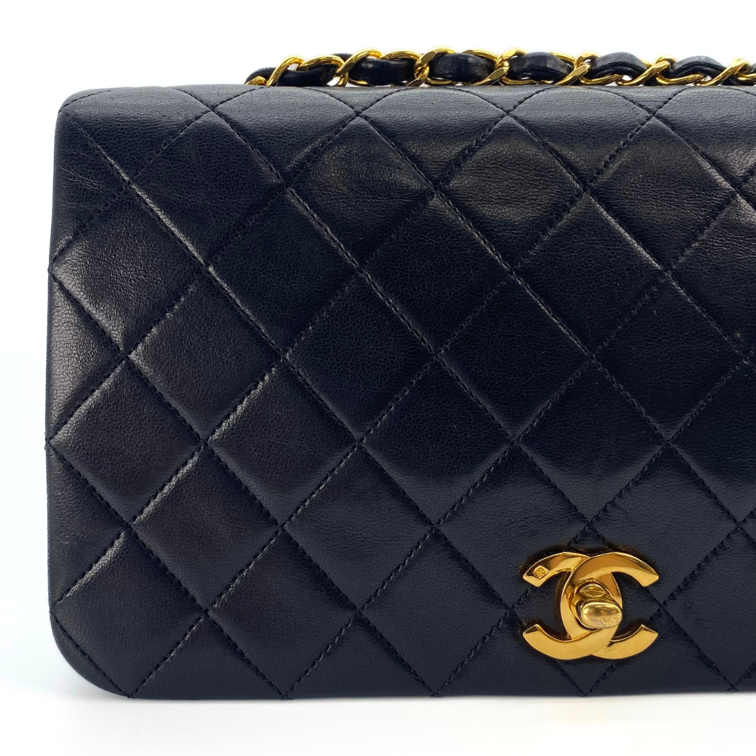 Evadne, 1 Series Small Full Flap Black Lambskin with seal and card