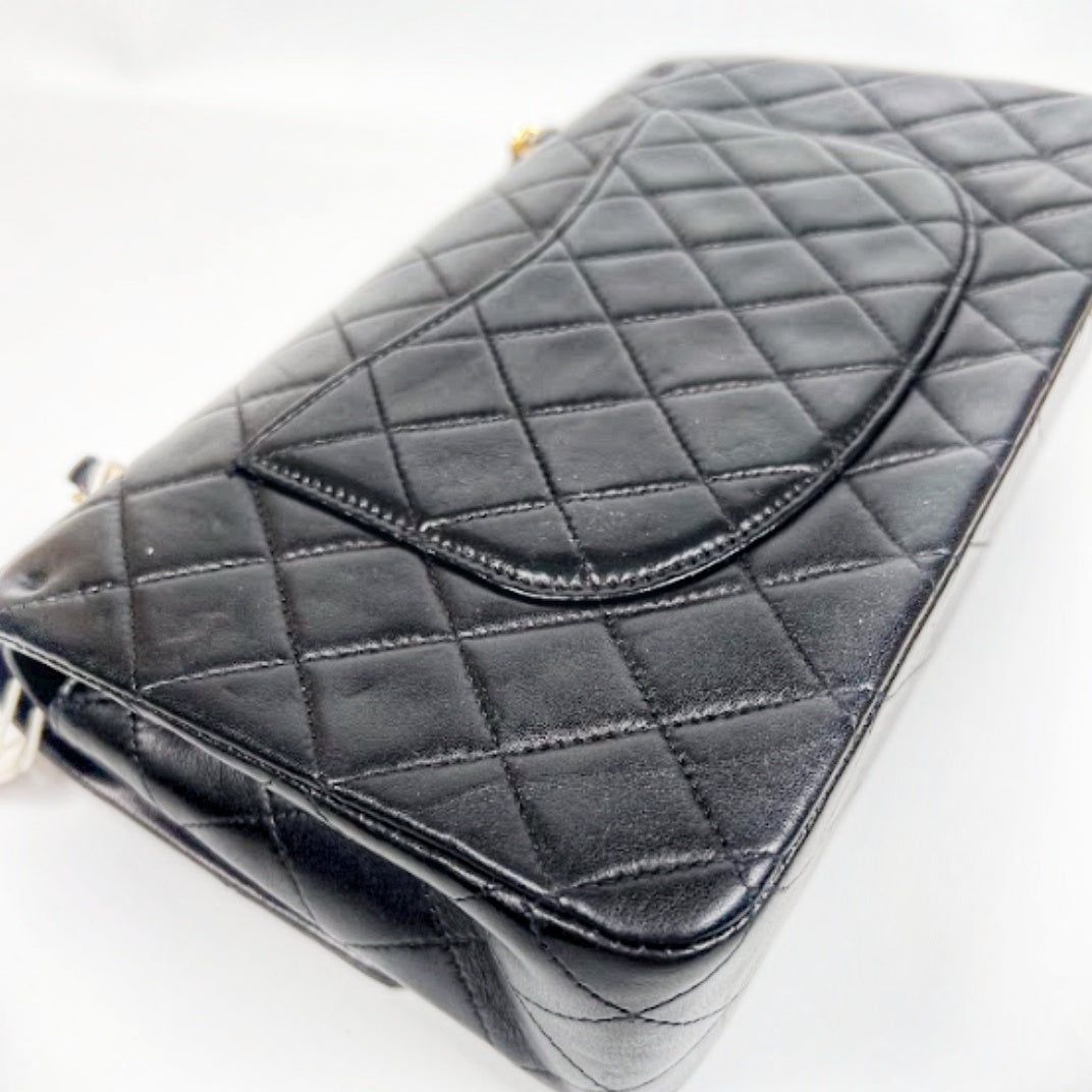 Ingrid, Vintage Authentic Chanel 6 series medium classic flap black lambskin with seal and card