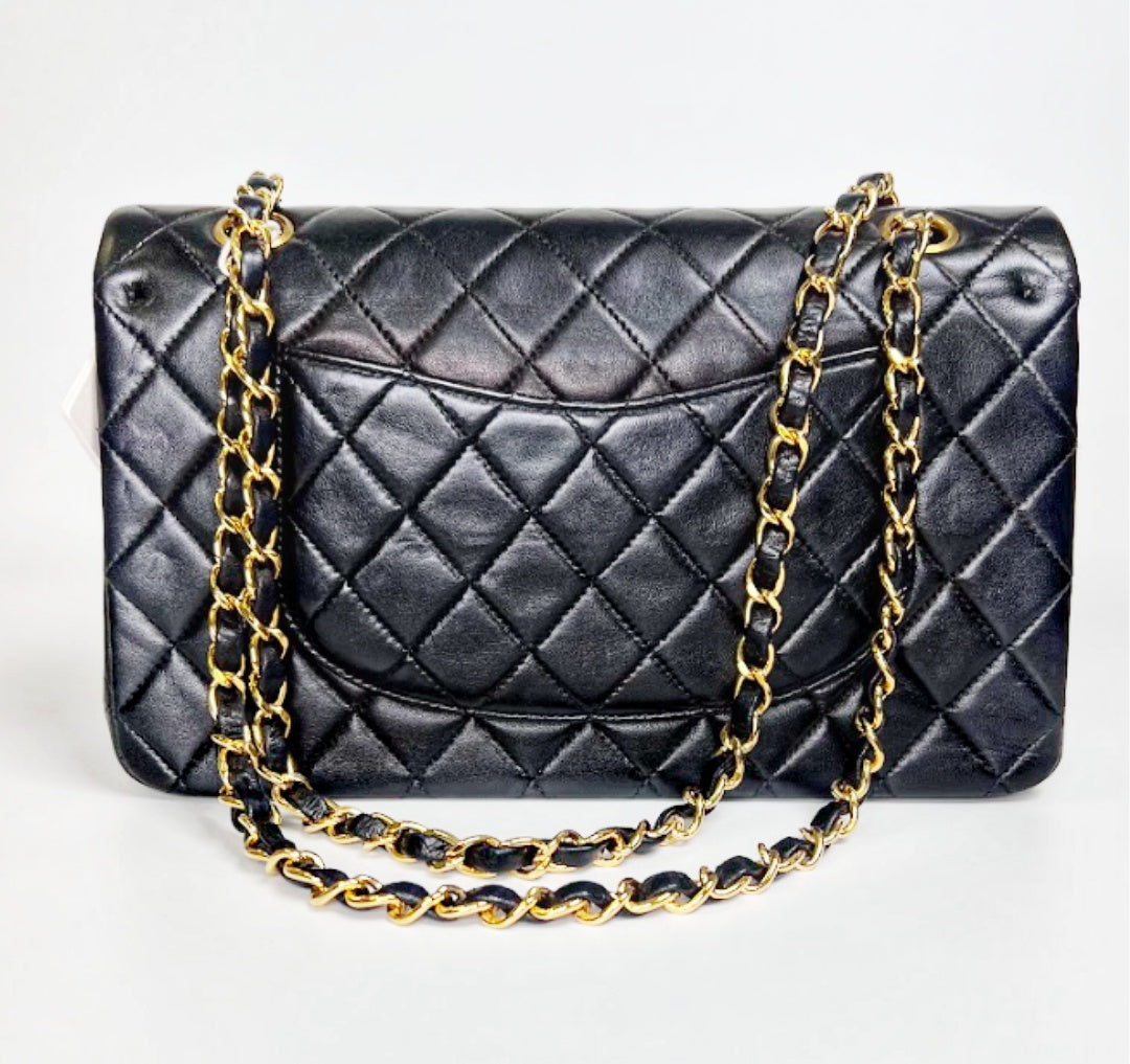 Ingrid, Vintage Authentic Chanel 6 series medium classic flap black lambskin with seal and card