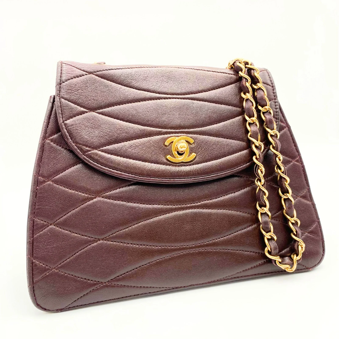 Kensley, Vintage Authentic Chanel 1 series chain brown lambskin with seal and card
