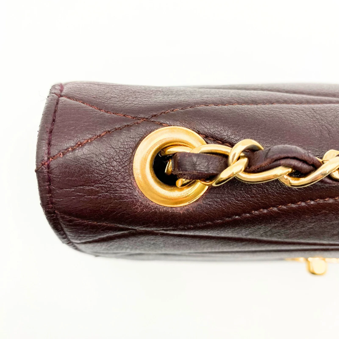 Kensley, Vintage Authentic Chanel 1 series chain brown lambskin with seal and card