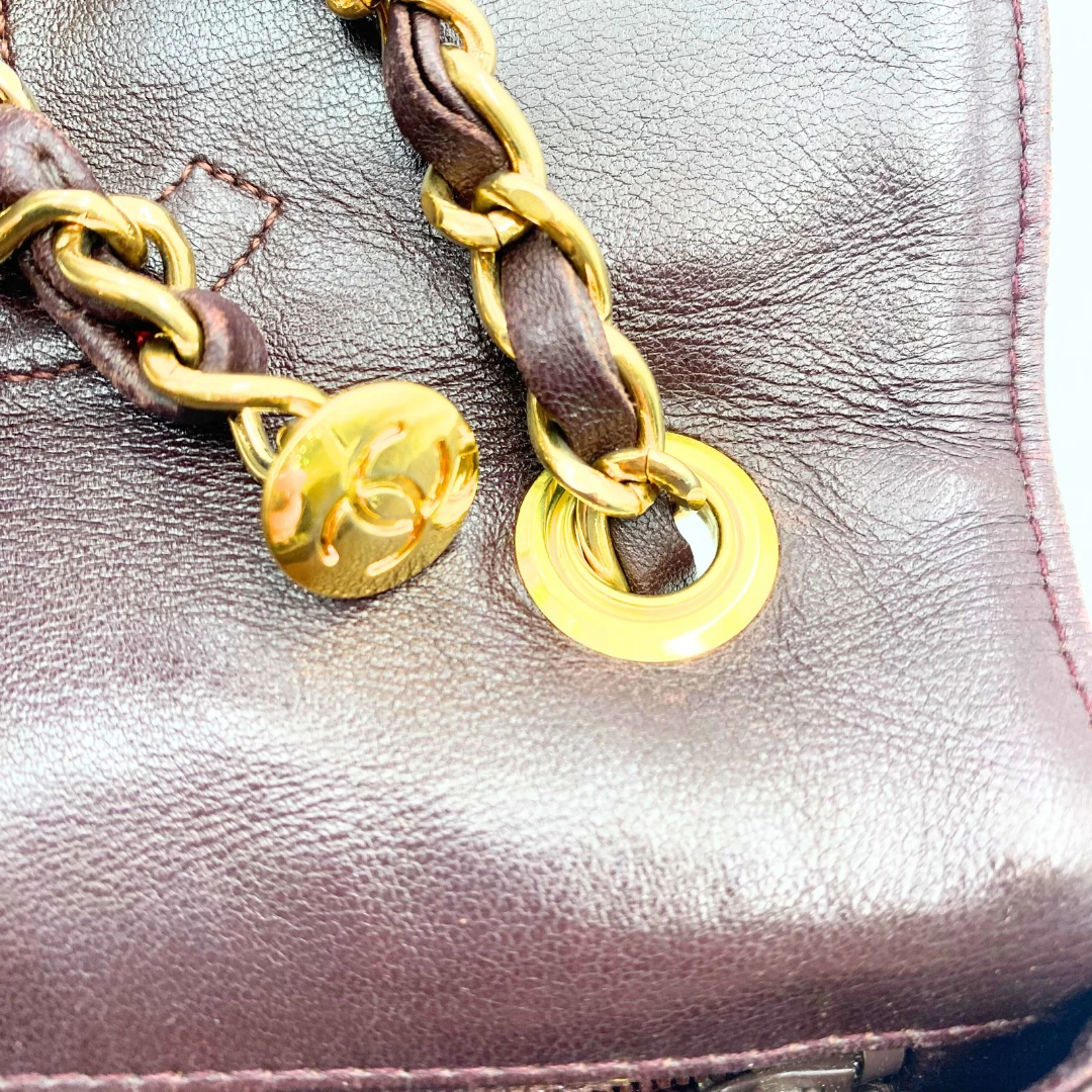 Kensley, Vintage Authentic Chanel 1 series chain brown lambskin with seal and card