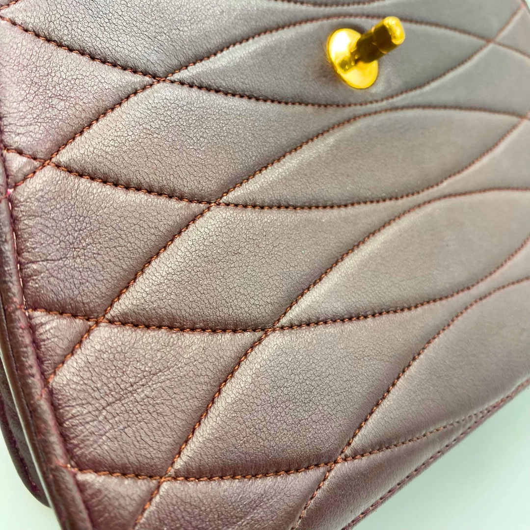 Kensley, Vintage Authentic Chanel 1 series chain brown lambskin with seal and card