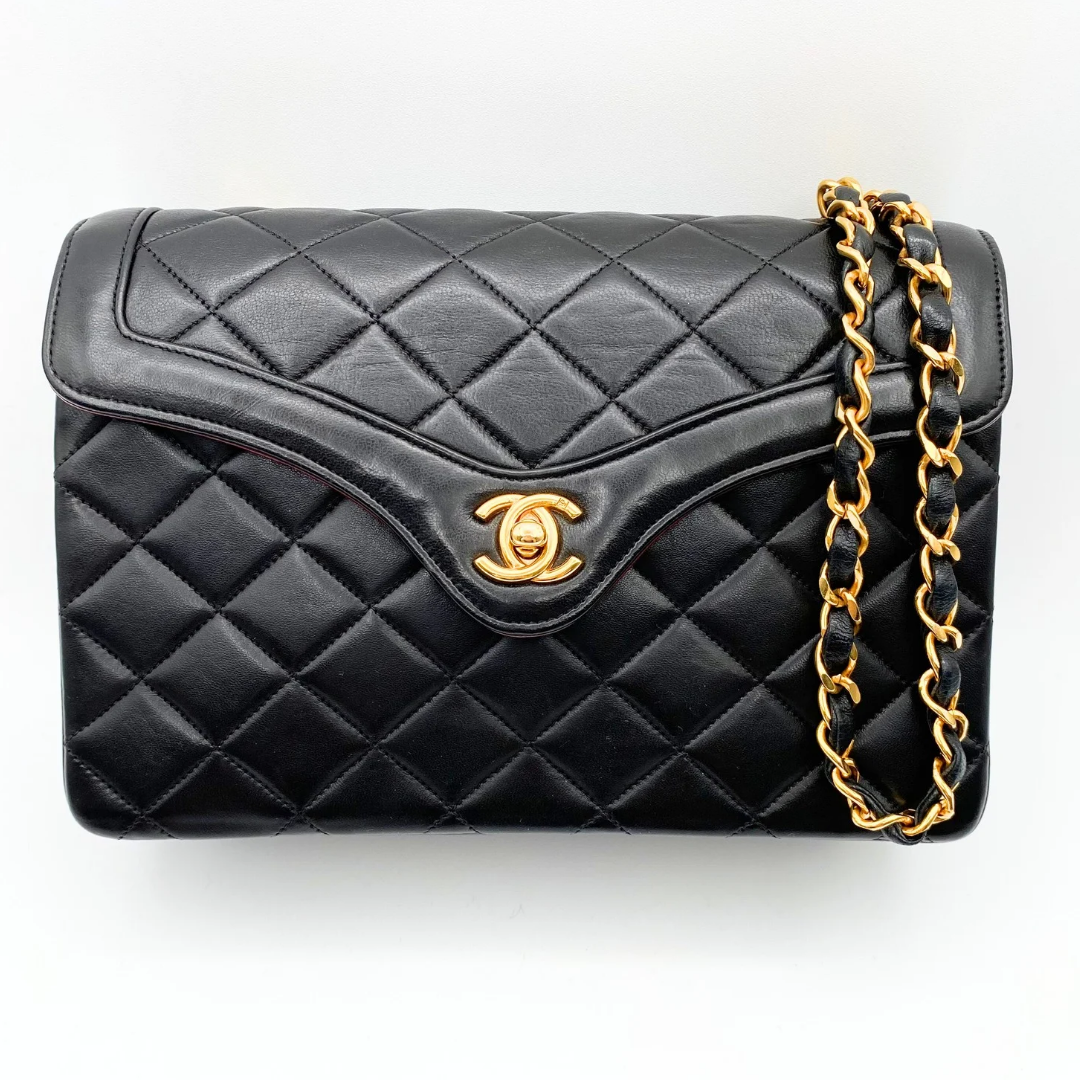 Marieta, 2 series vintage authentic Chanel black lambskin mini with seal only