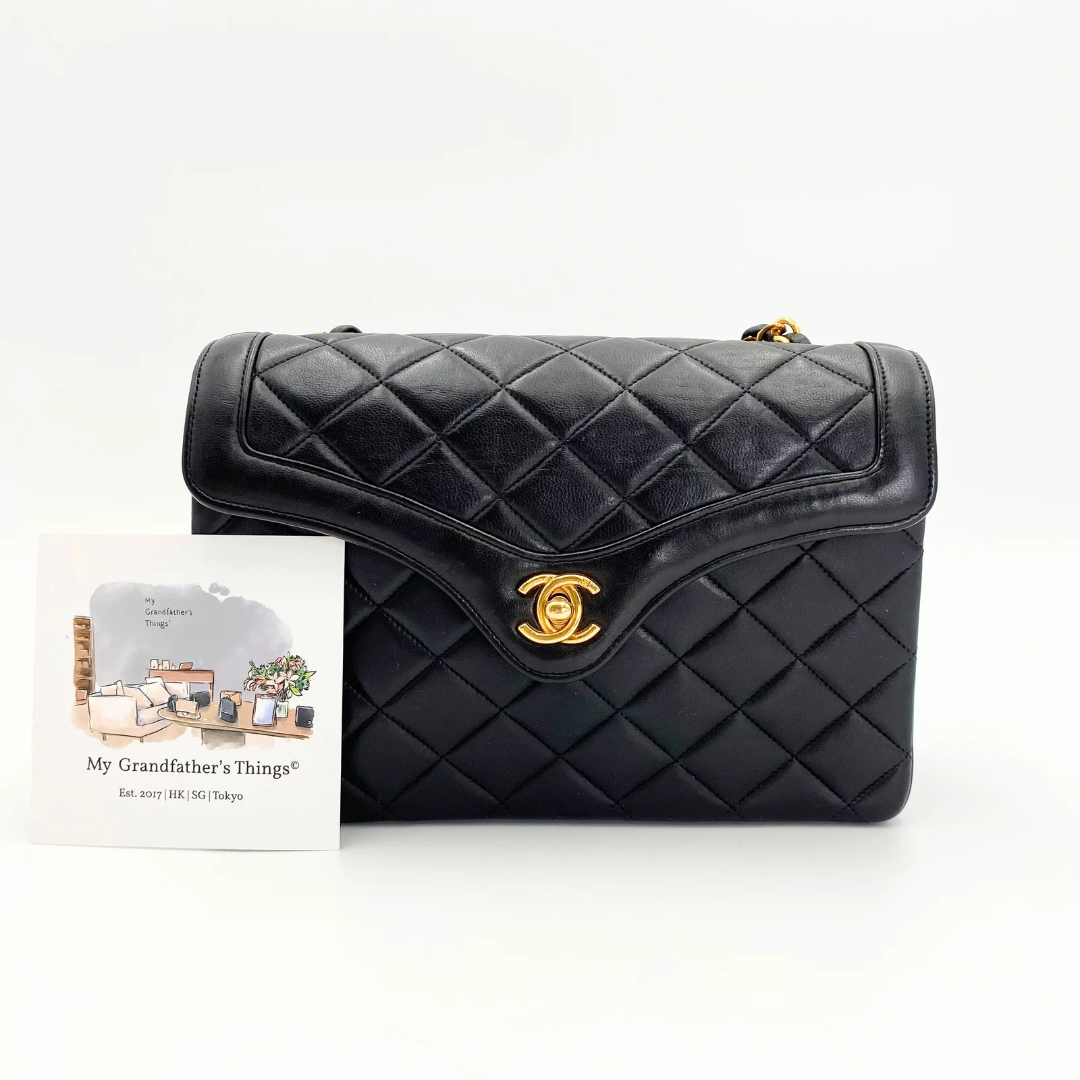 Marieta, 2 series vintage authentic Chanel black lambskin mini with seal only