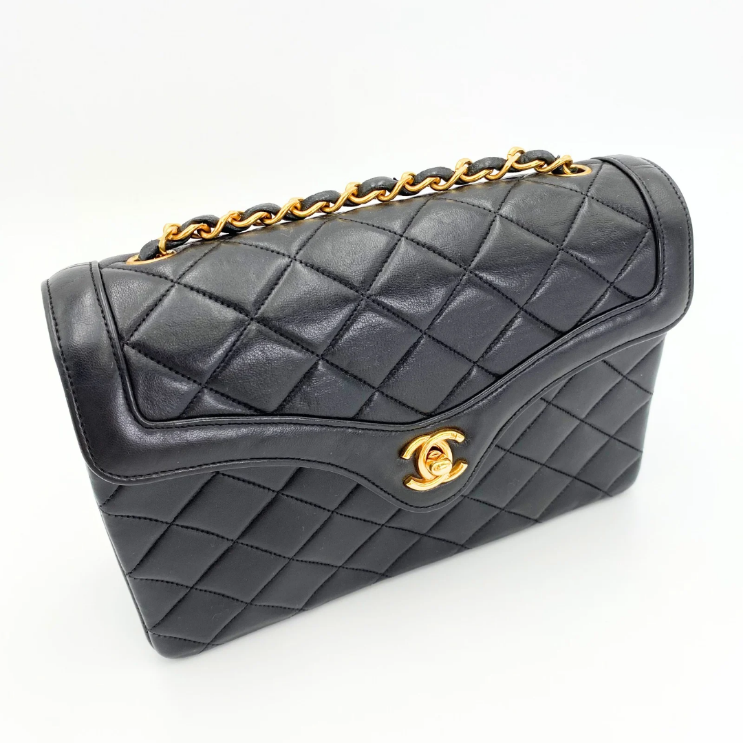 Marieta, 2 series vintage authentic Chanel black lambskin mini with seal only