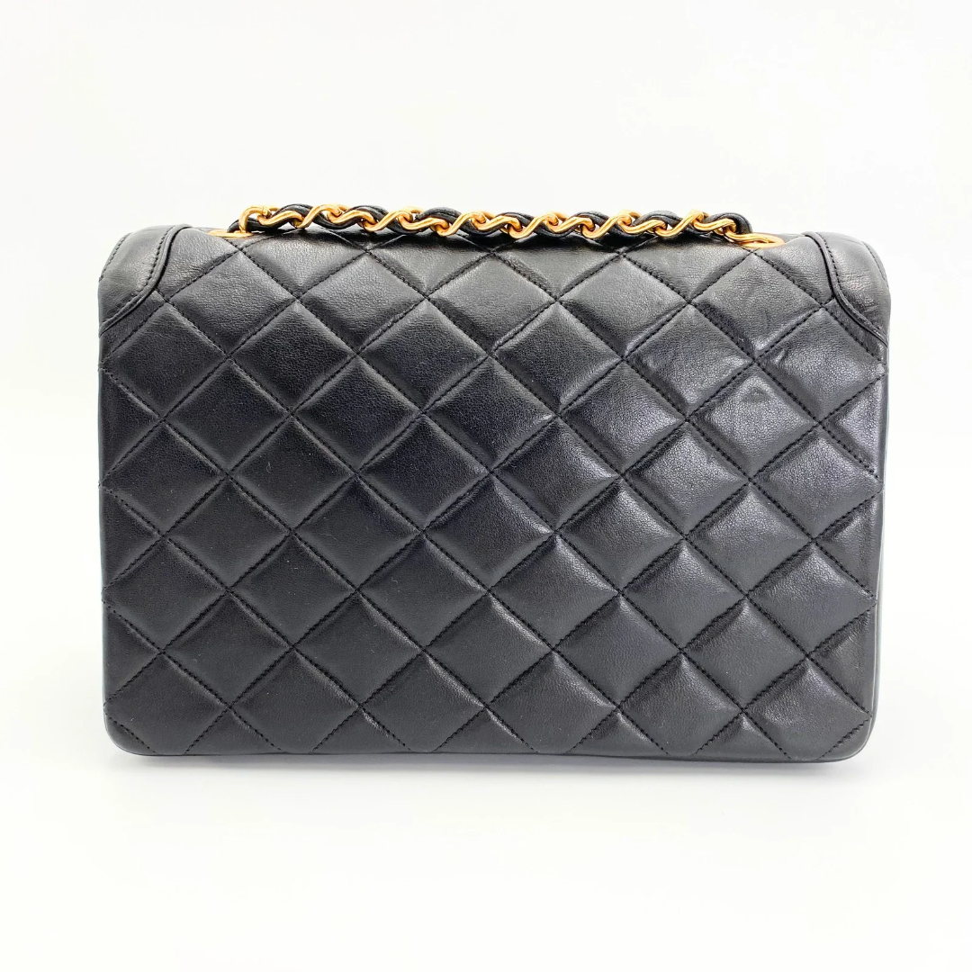 Marieta, 2 series vintage authentic Chanel black lambskin mini with seal only