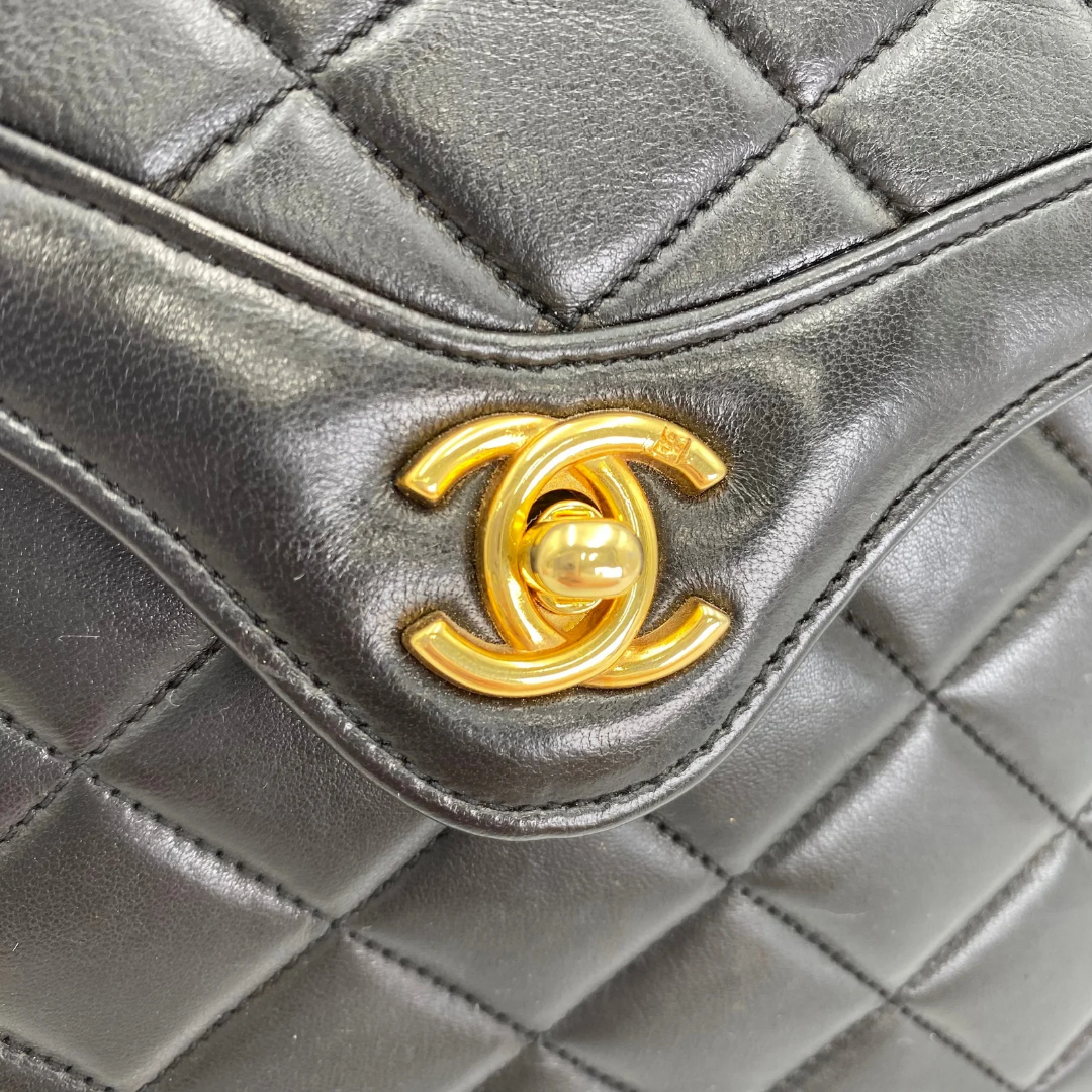 Marieta, 2 series vintage authentic Chanel black lambskin mini with seal only