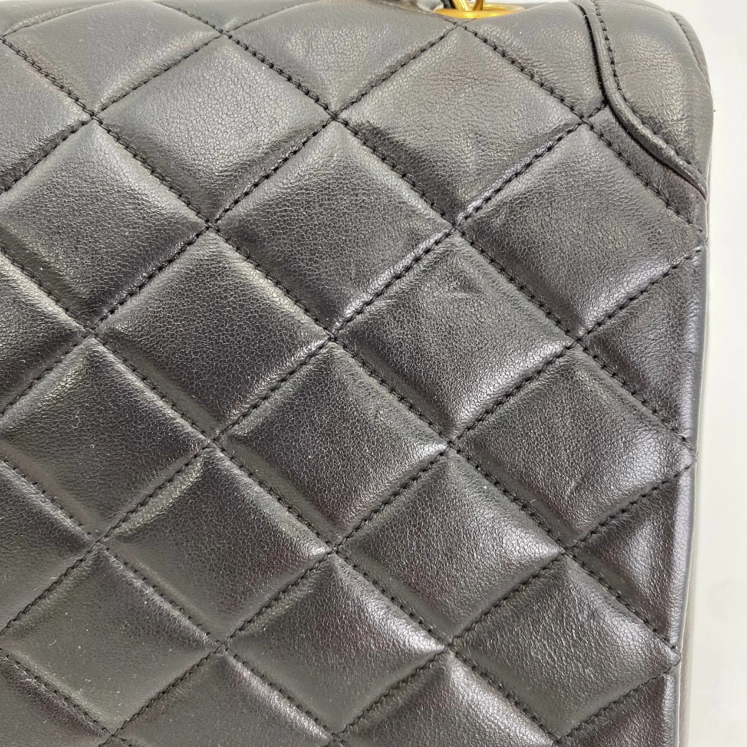 Marieta, 2 series vintage authentic Chanel black lambskin mini with seal only