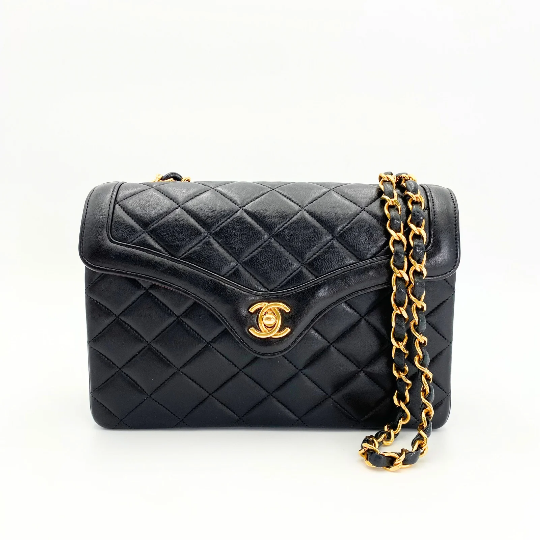 Marieta, 2 series vintage authentic Chanel black lambskin mini with seal only