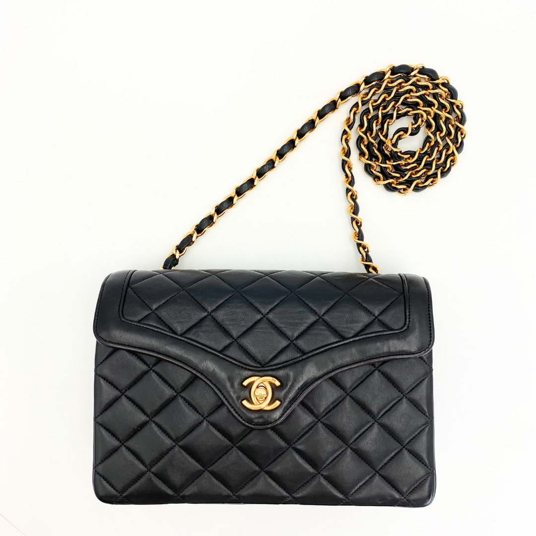 Marieta, 2 series vintage authentic Chanel black lambskin mini with seal only