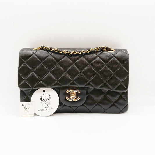 Sean, Vintage Authentic Chanel 3 series small black lambskin flap with serial and card