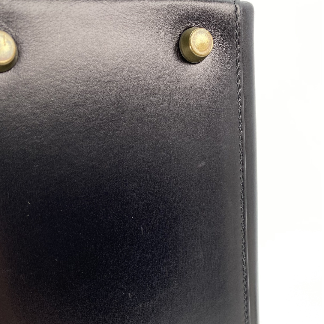 Malin, 1966 Kely 32 Retourne Black Boxcalf with stamp V
