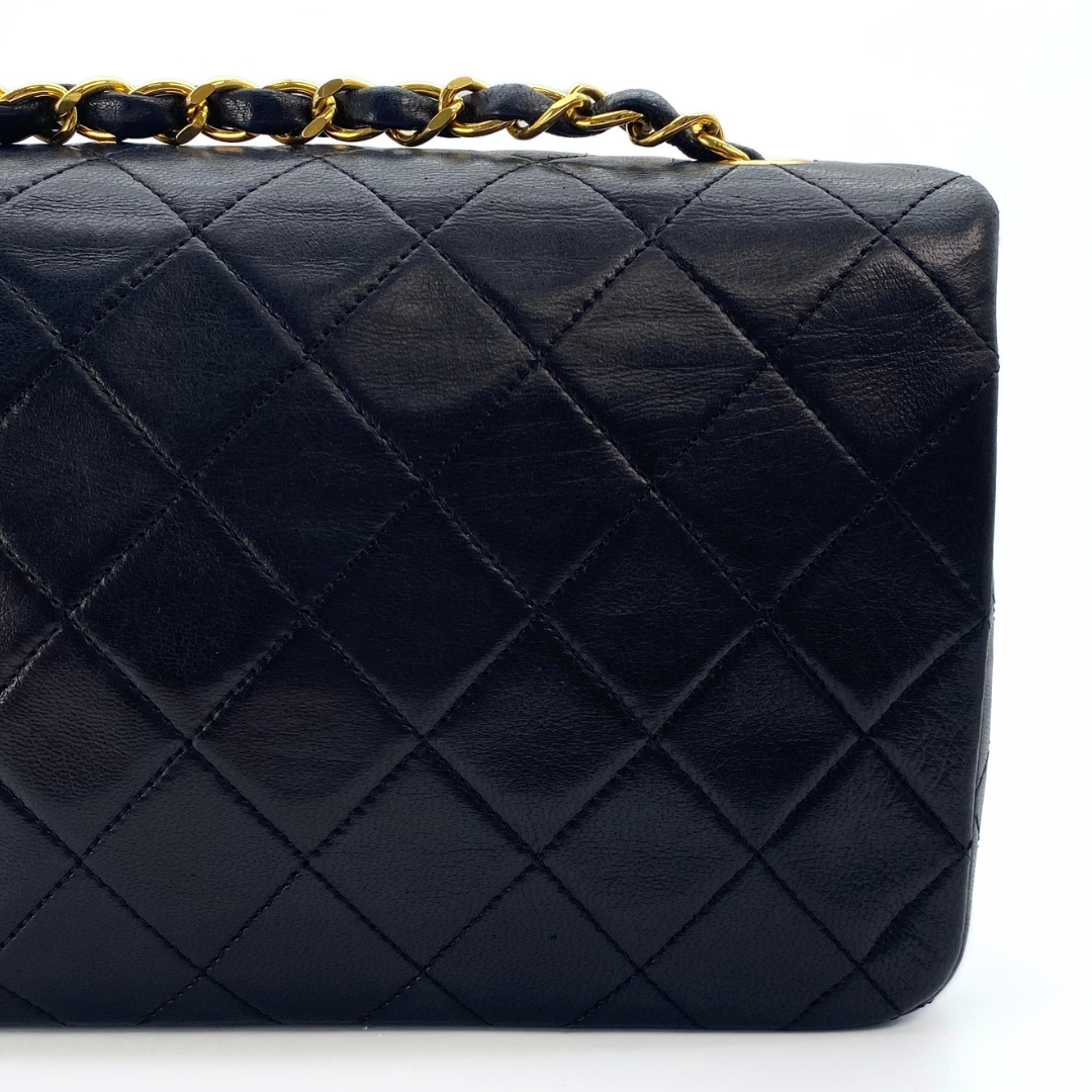 Evadne, 1 Series Small Full Flap Black Lambskin with seal and card