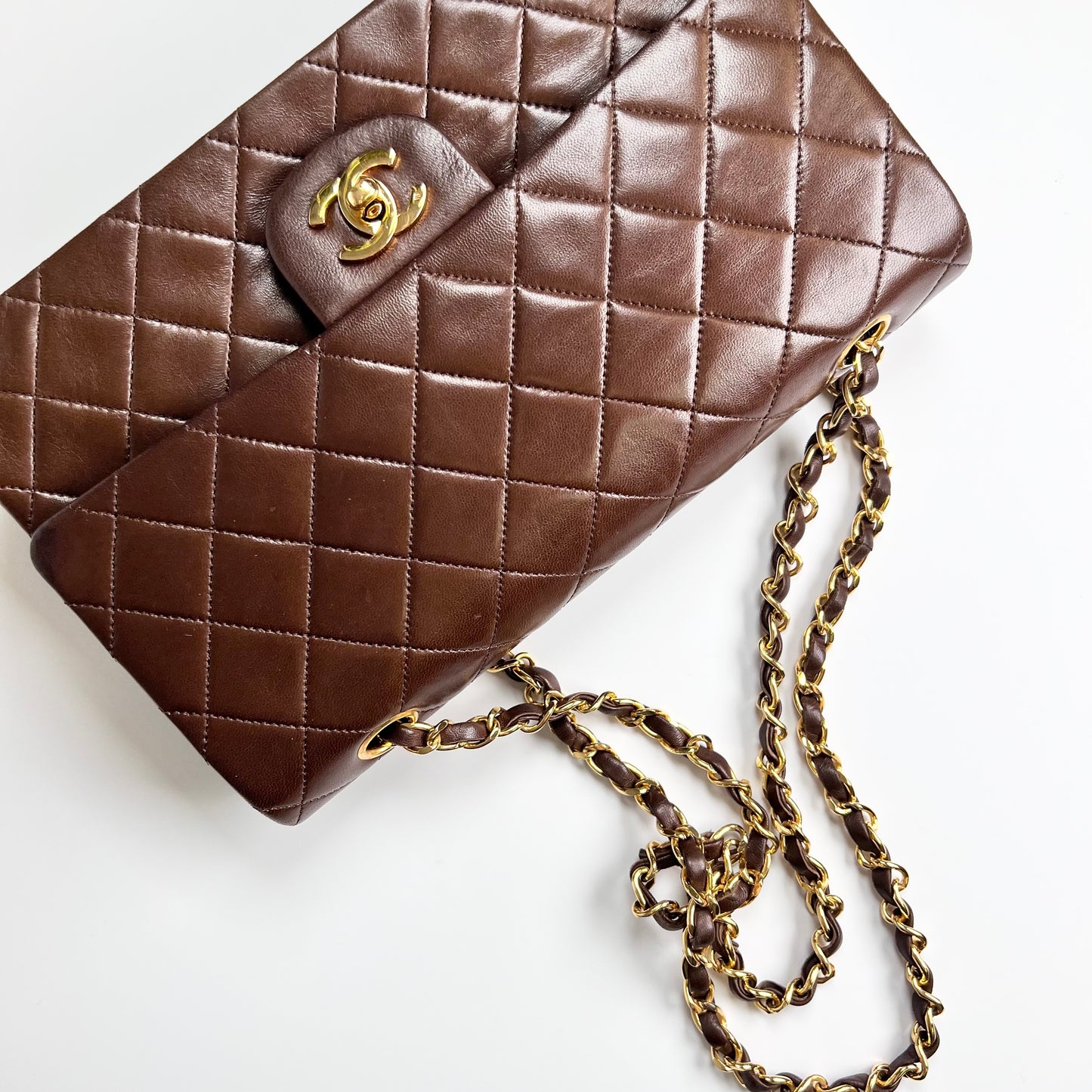 Bracha, Vintage Authentic Chanel 1 series medium brown lambskin classic flap with seal and card