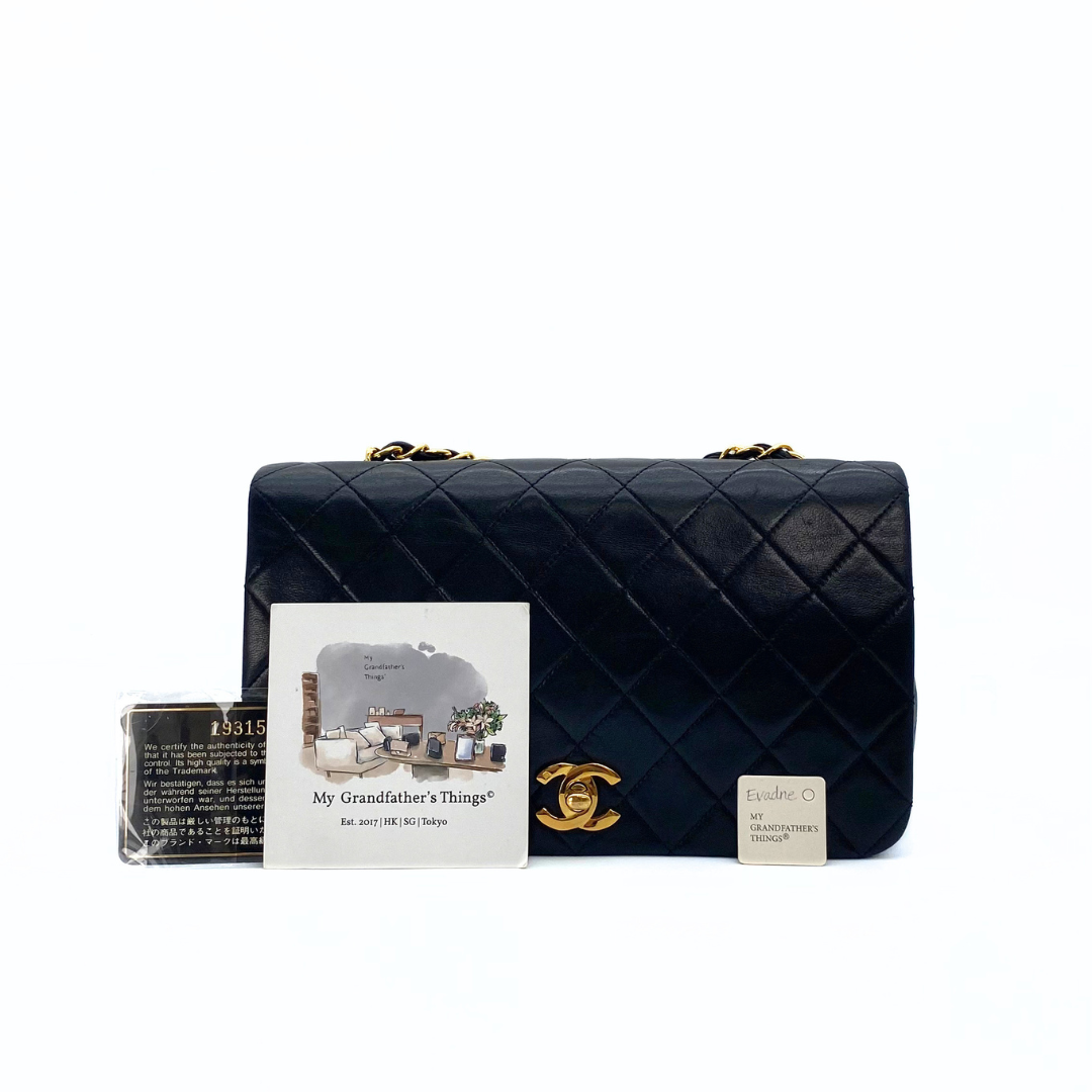 Evadne, 1 Series Small Full Flap Black Lambskin with seal and card