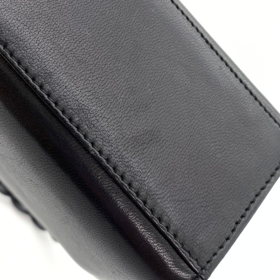 Makoto, 4 Series Turnlock Black Lambskin with seal and card