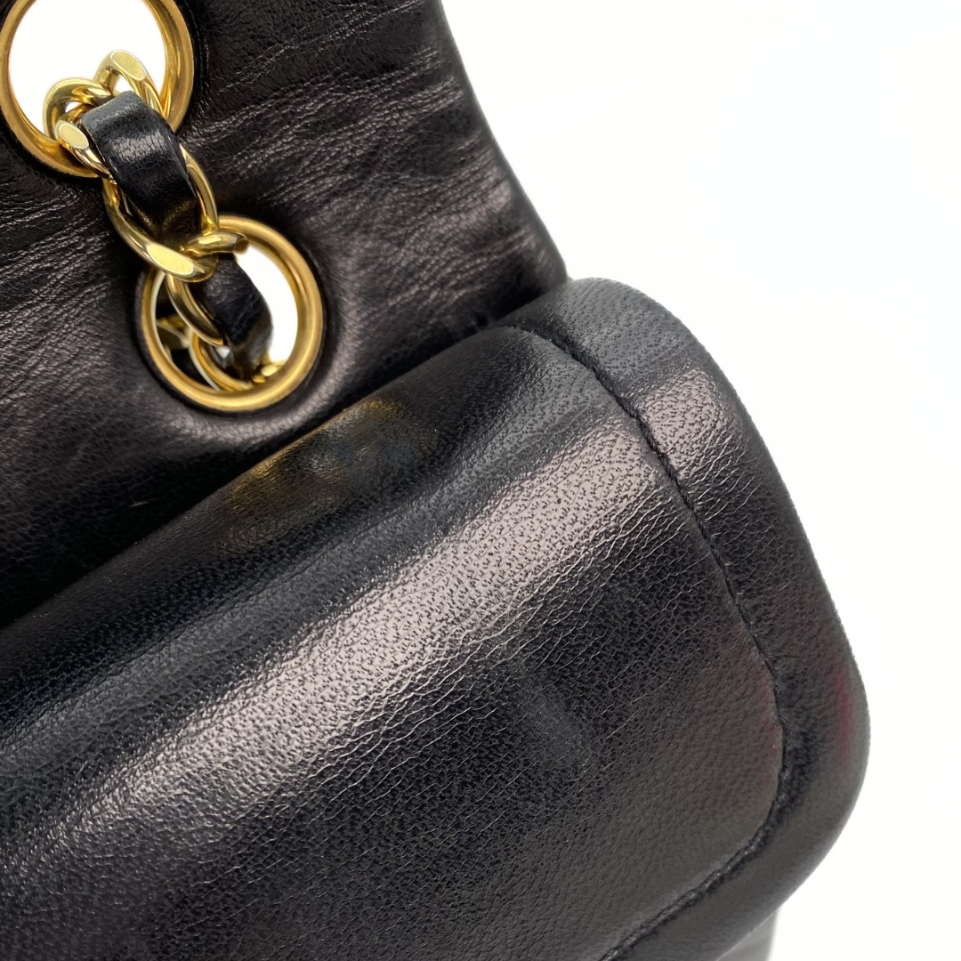 Zinnia, 1 Series Small Classic Flap Black Lambskin with seal only