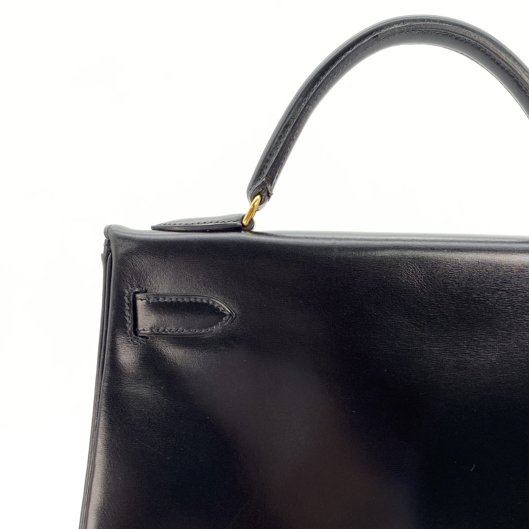 Malin, 1966 Kely 32 Retourne Black Boxcalf with stamp V