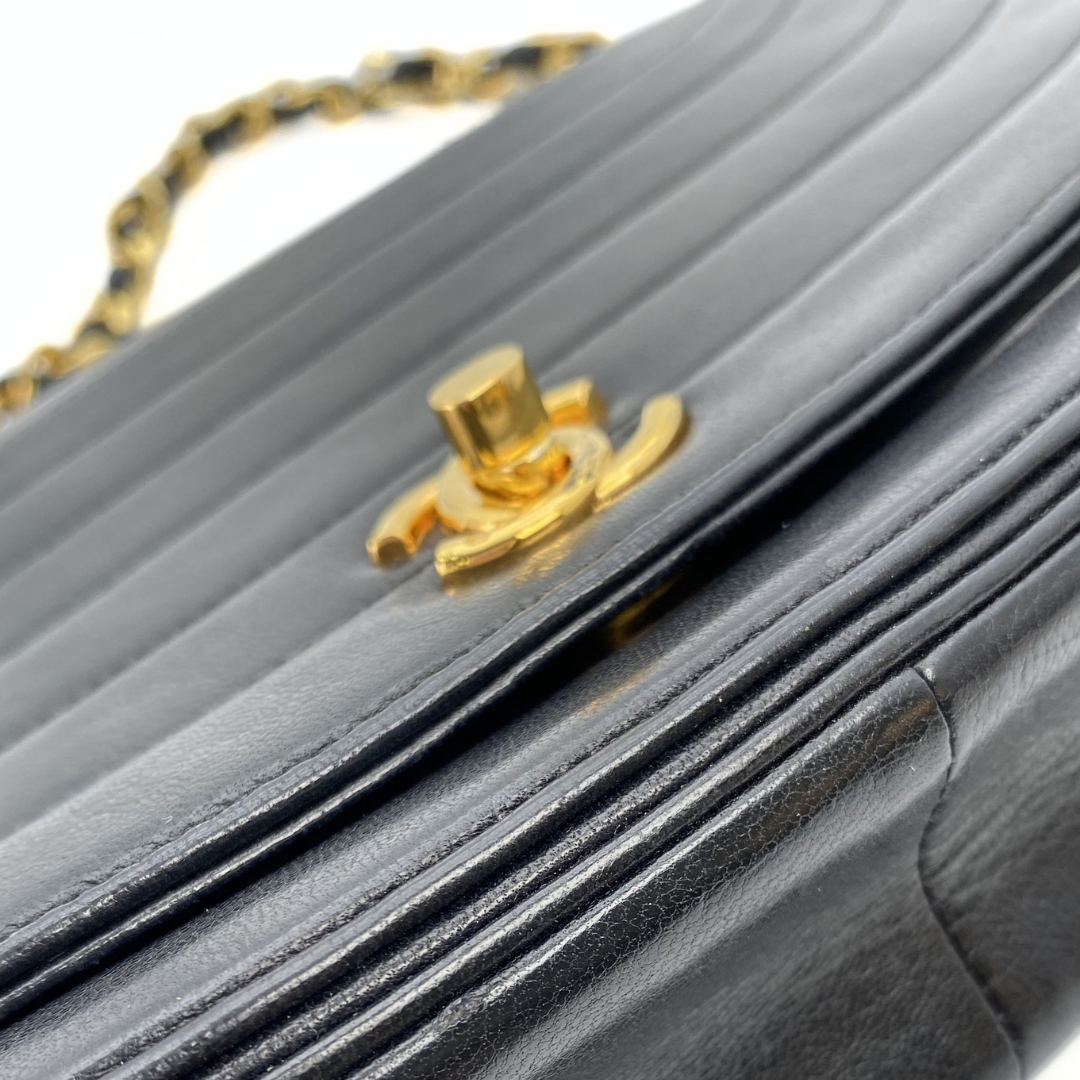 Ega, 0 Series Wave Stitch Black Lambskin Half moon with seal and card