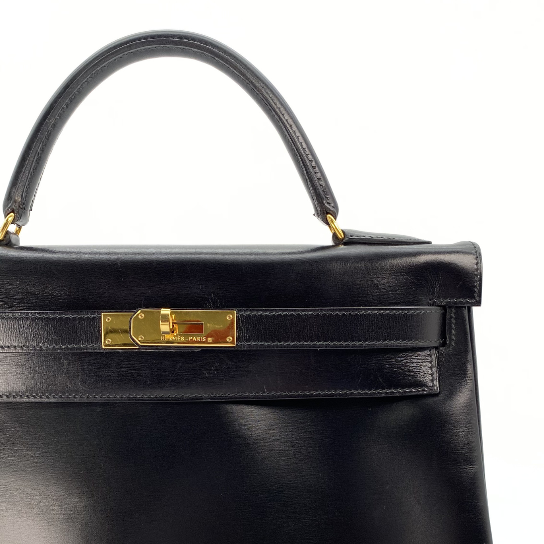 Malin, 1966 Kely 32 Retourne Black Boxcalf with stamp V