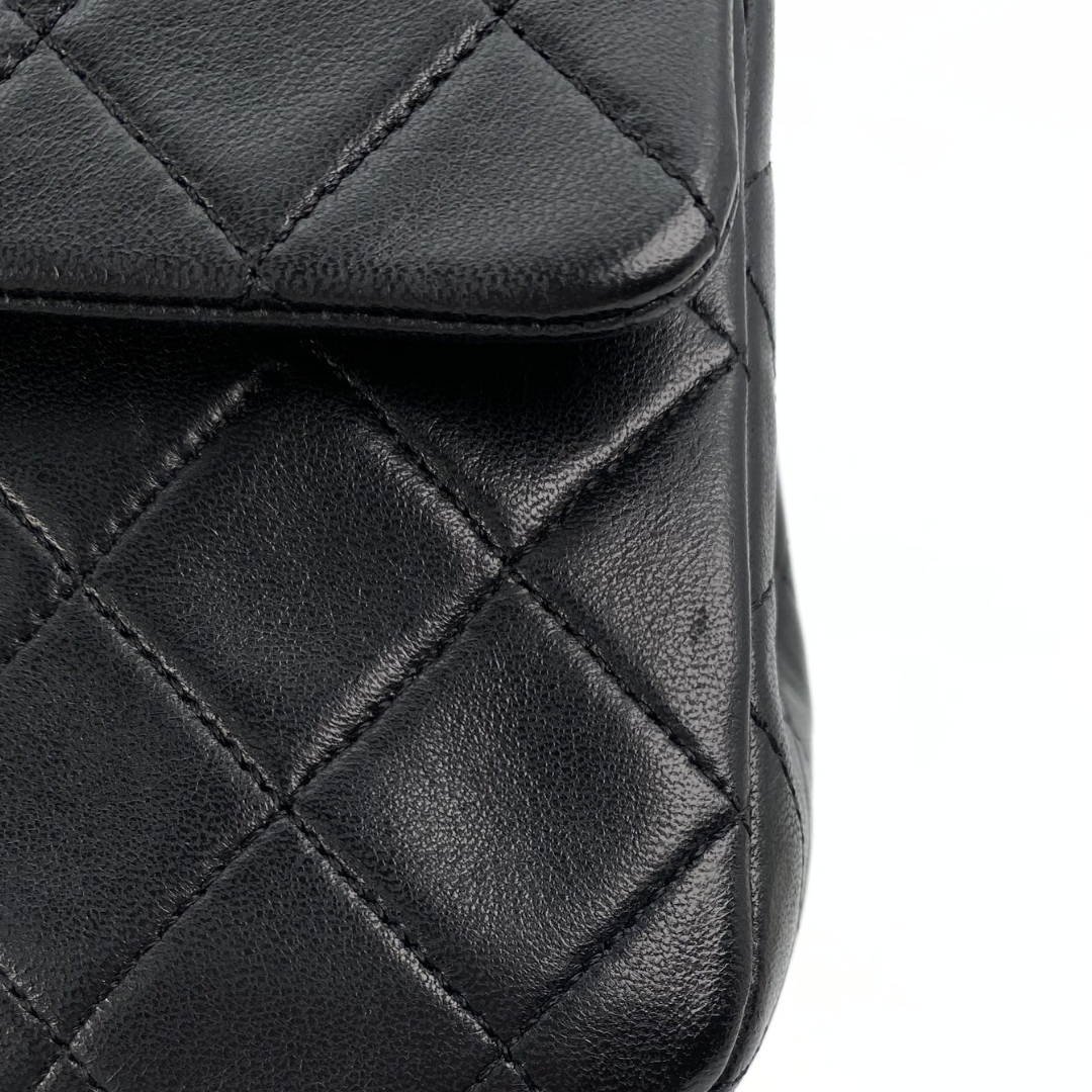 Zinnia, 1 Series Small Classic Flap Black Lambskin with seal only