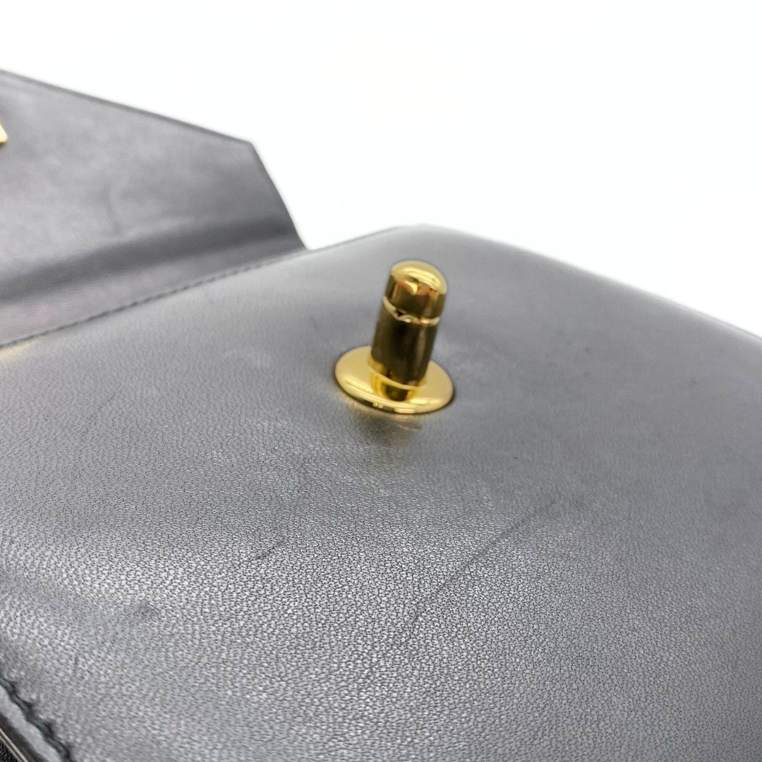 Makoto, 4 Series Turnlock Black Lambskin with seal and card