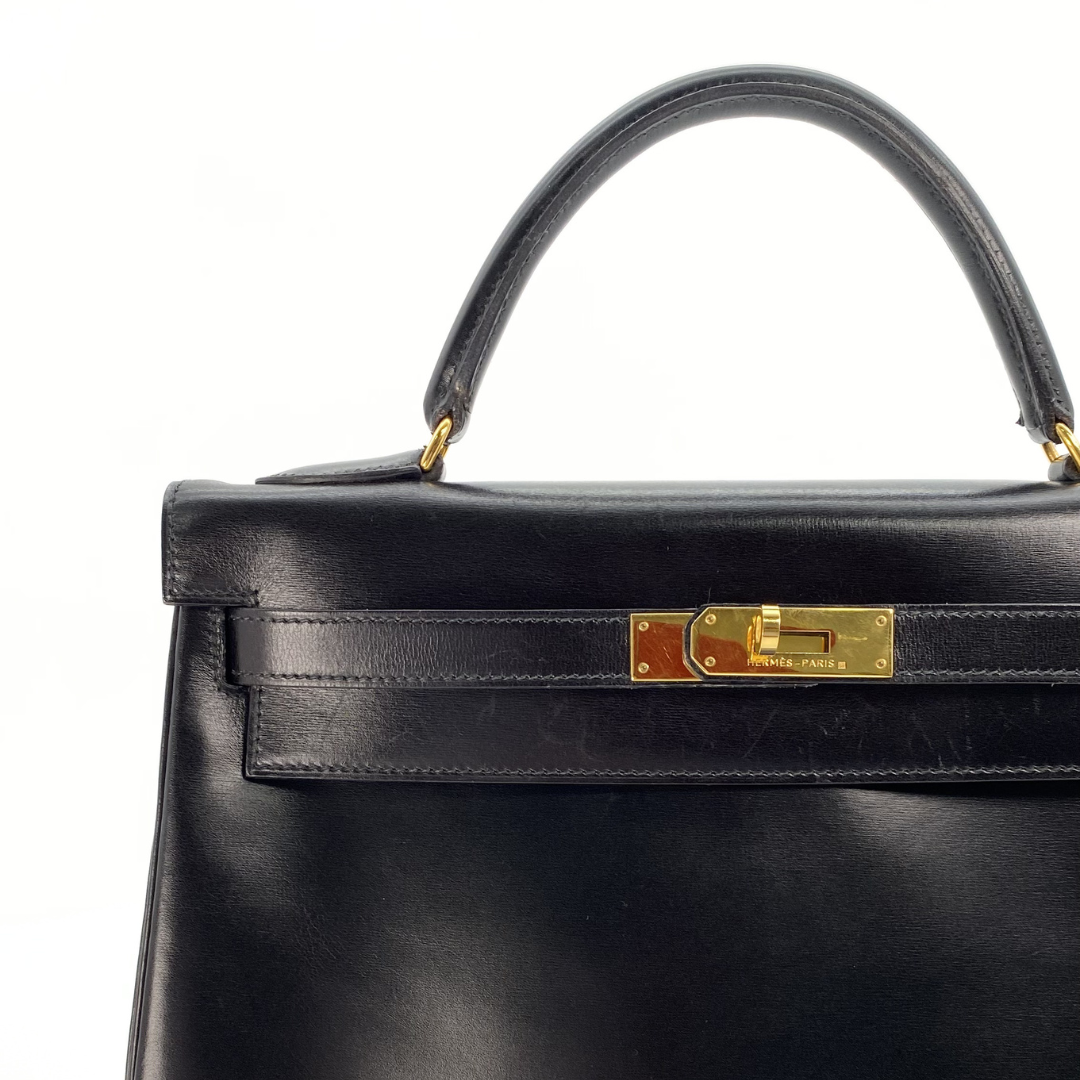 Malin, 1966 Kely 32 Retourne Black Boxcalf with stamp V