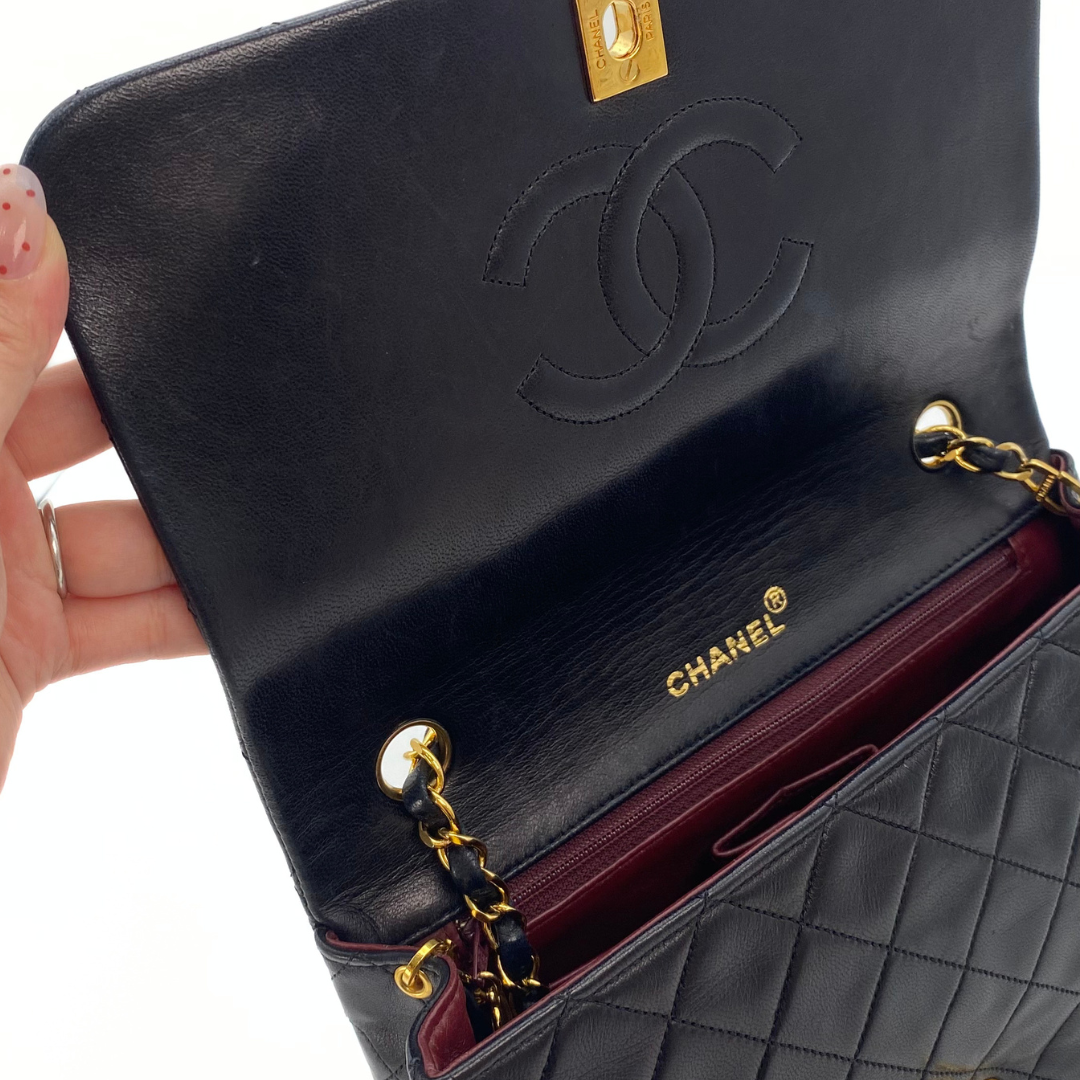 Evadne, 1 Series Small Full Flap Black Lambskin with seal and card