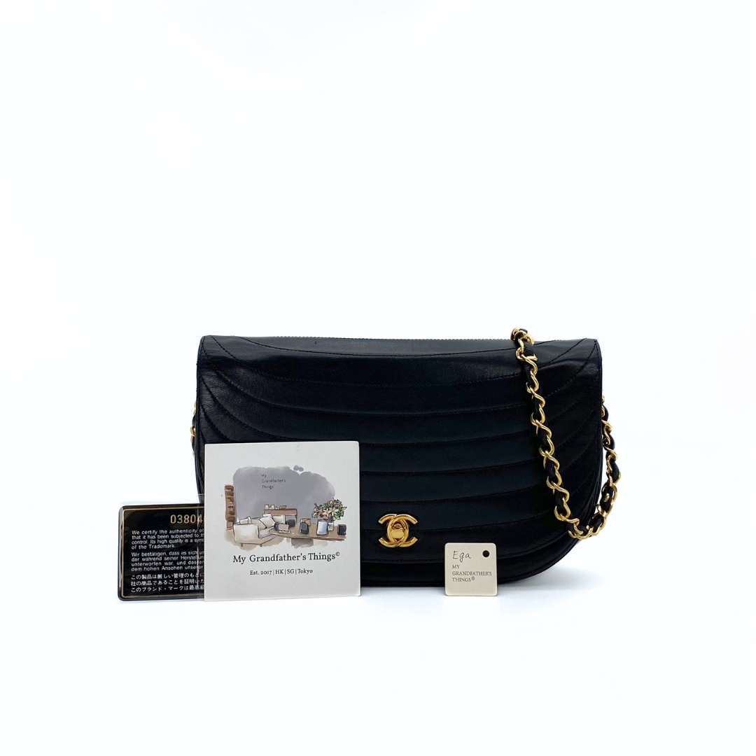 Ega, 0 Series Wave Stitch Black Lambskin Half moon with seal and card