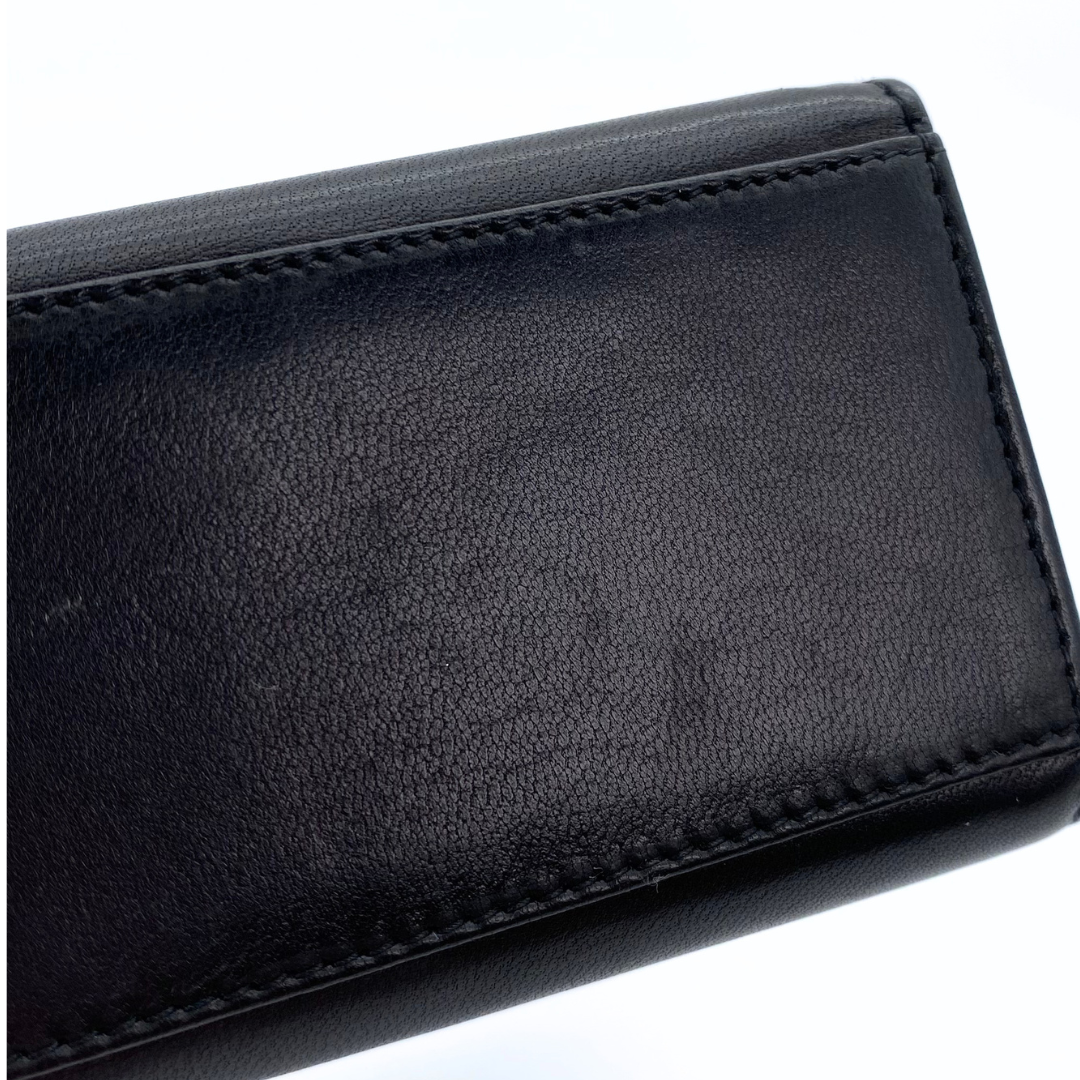 Makoto, 4 Series Turnlock Black Lambskin with seal and card