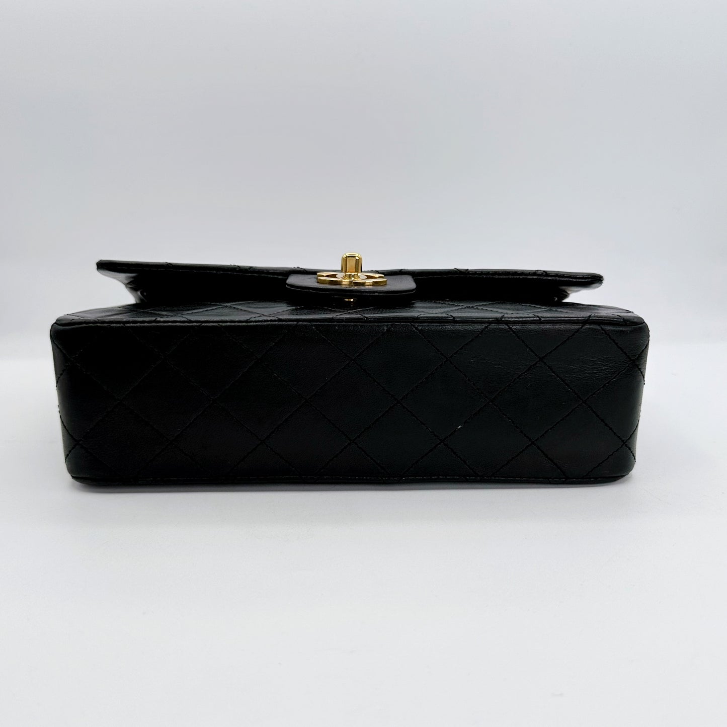 Coleman, Vintage Authentic Chanel 1 series small classic flap black lambskin with seal and card