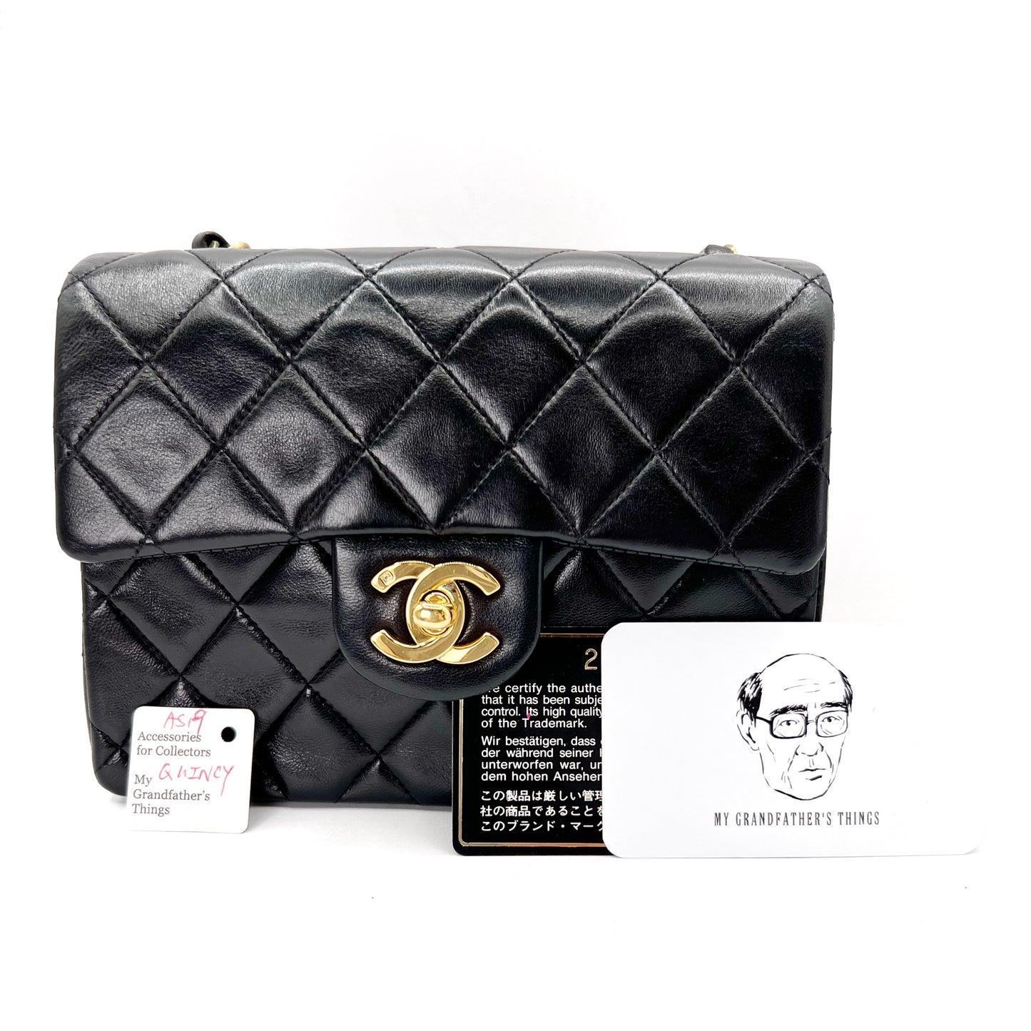 Quincy, Vintage Authentic Chanel 2 series 17cm mini square black lambskin with seal and card