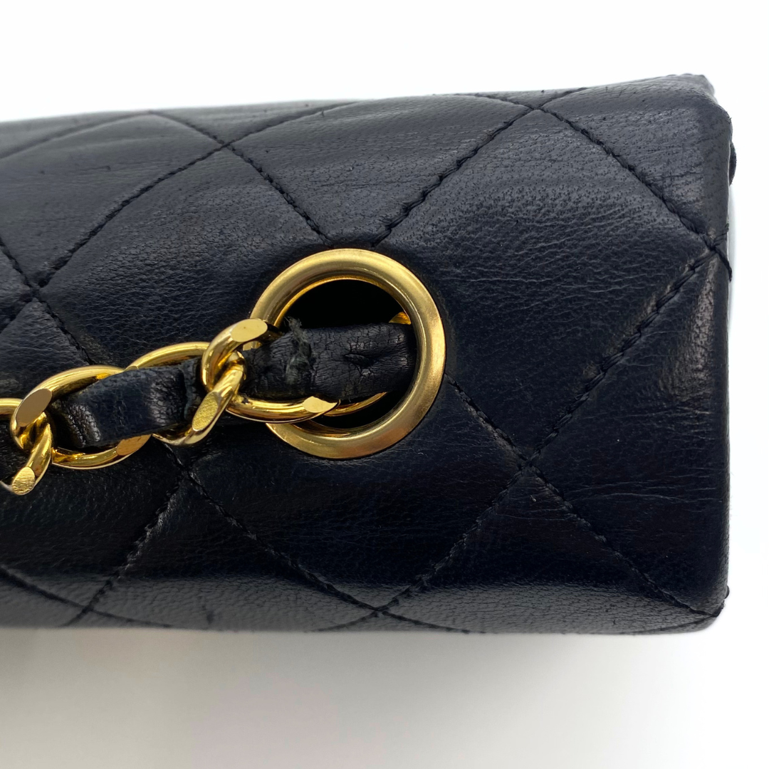 Evadne, 1 Series Small Full Flap Black Lambskin with seal and card