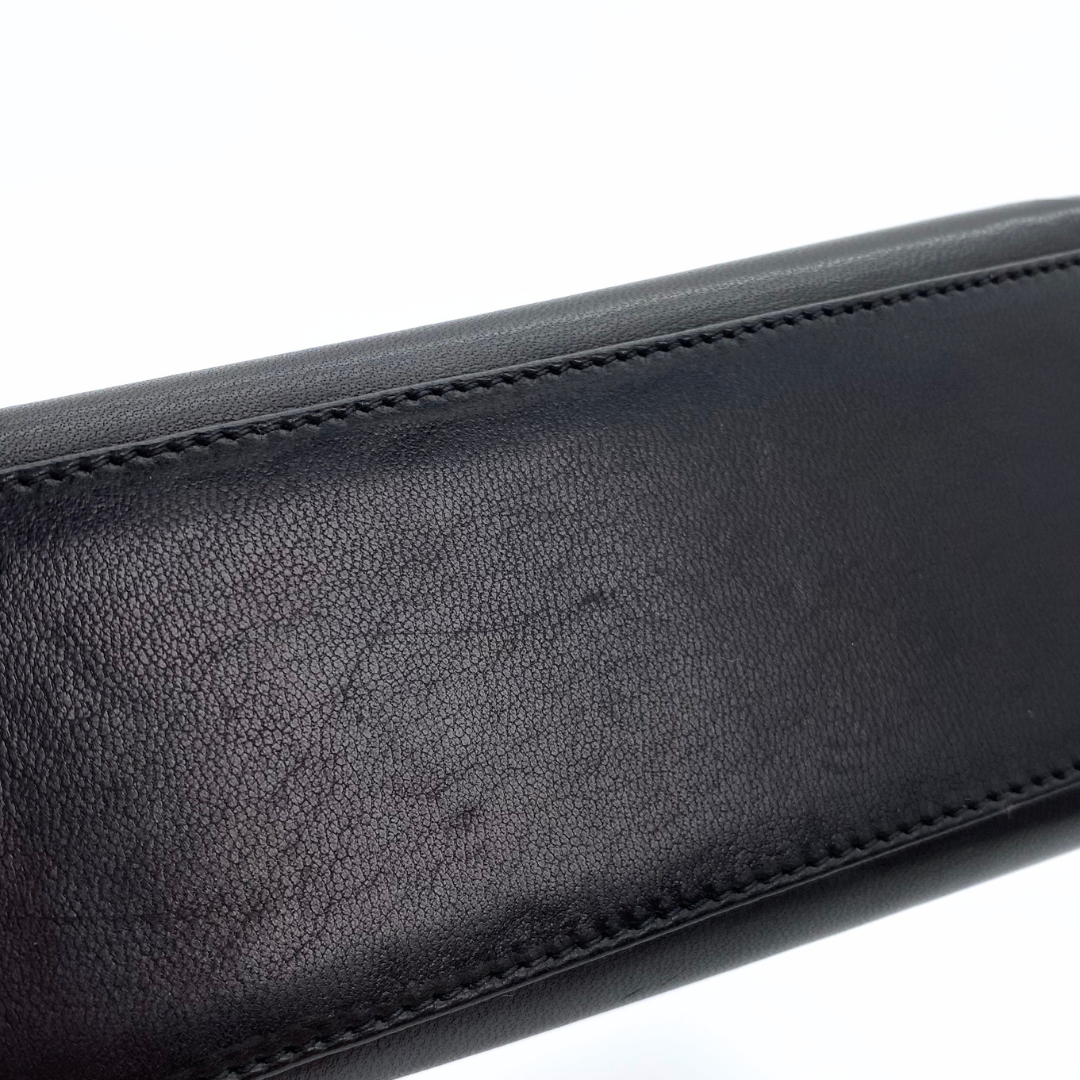 Makoto, 4 Series Turnlock Black Lambskin with seal and card
