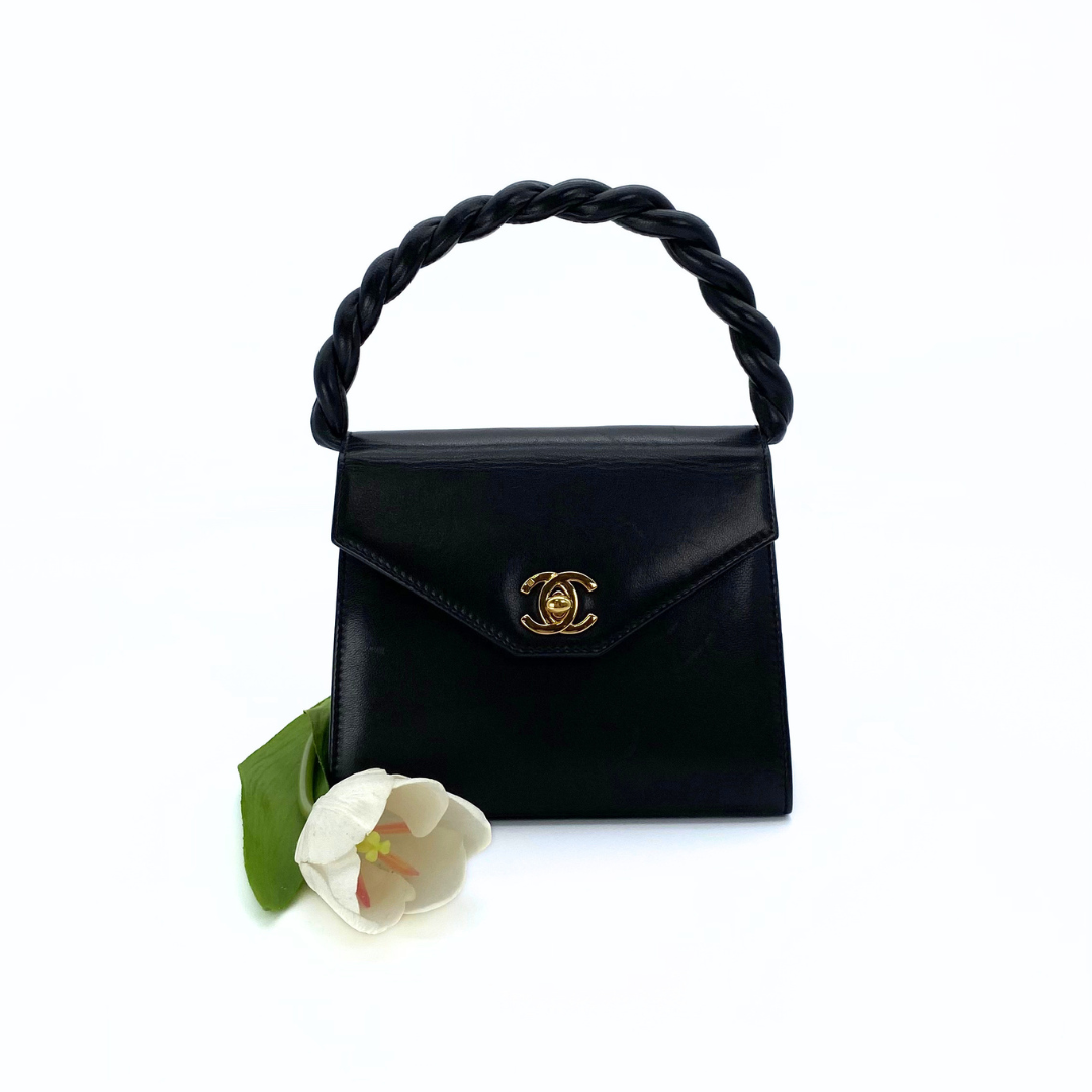 Makoto, 4 Series Turnlock Black Lambskin with seal and card