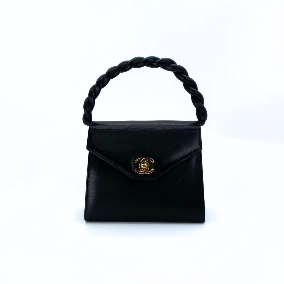 Makoto, 4 Series Turnlock Black Lambskin with seal and card