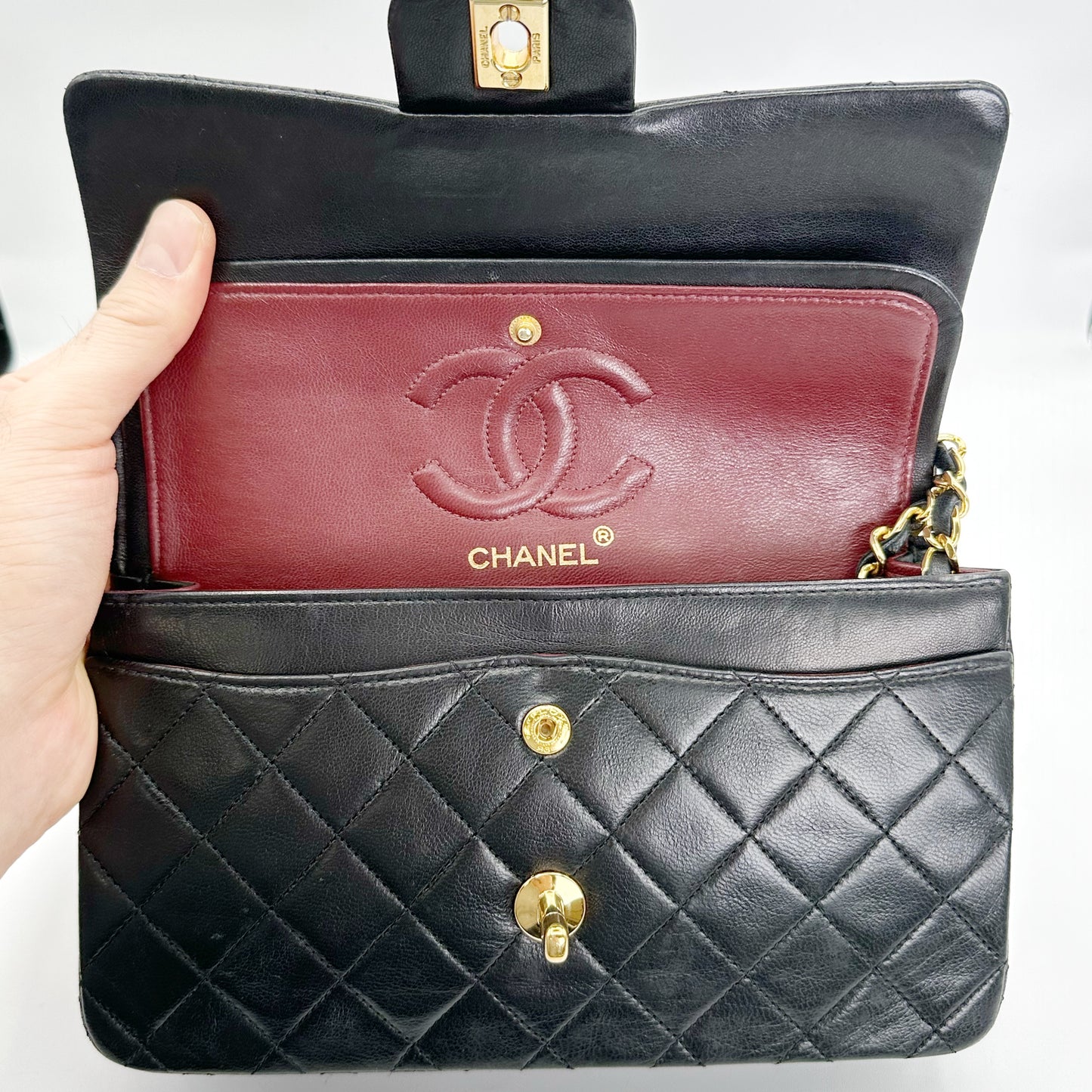 Coleman, Vintage Authentic Chanel 1 series small classic flap black lambskin with seal and card