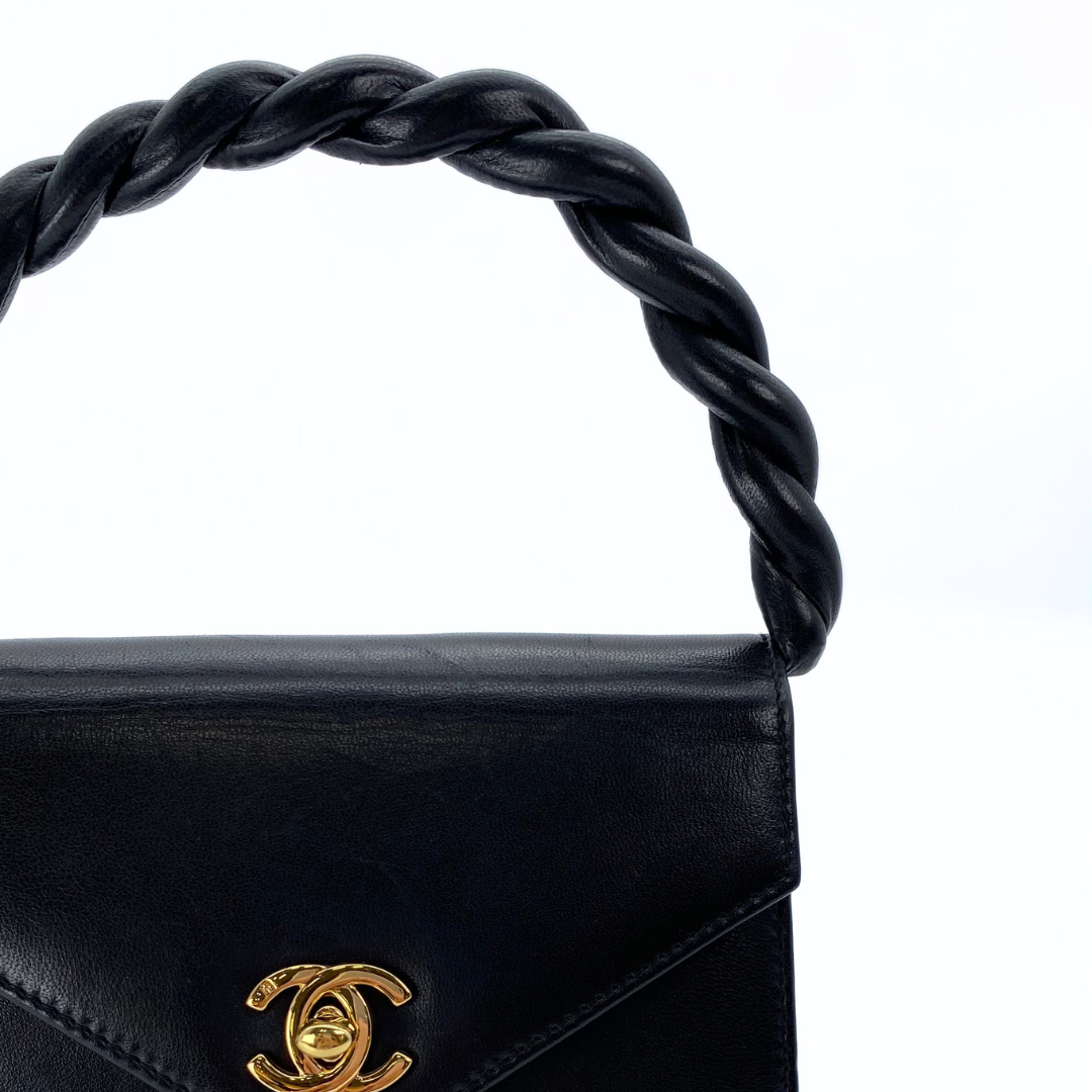 Makoto, 4 Series Turnlock Black Lambskin with seal and card