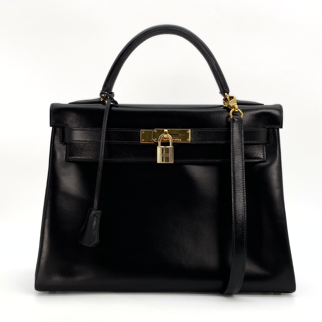 Malin, 1966 Kely 32 Retourne Black Boxcalf with stamp V
