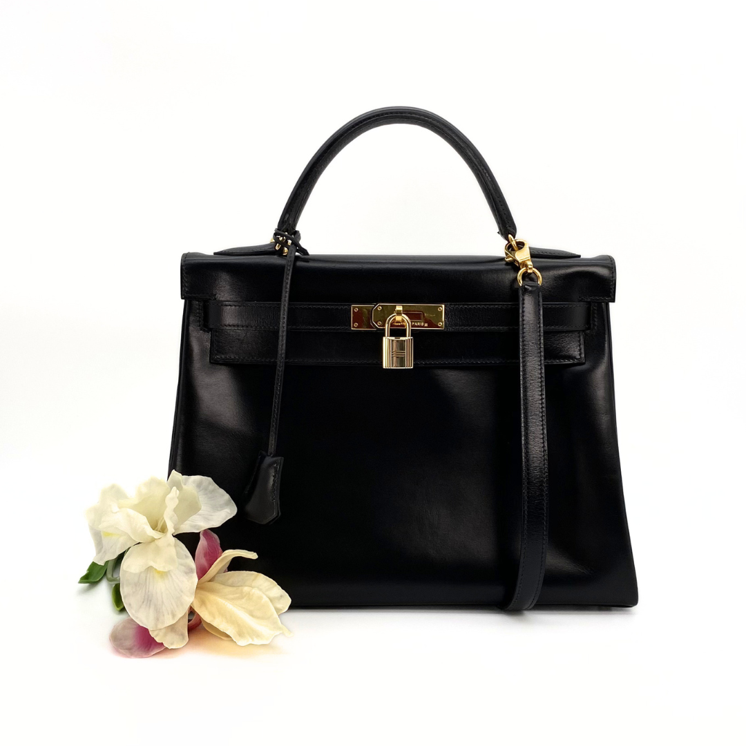 Malin, 1966 Kely 32 Retourne Black Boxcalf with stamp V