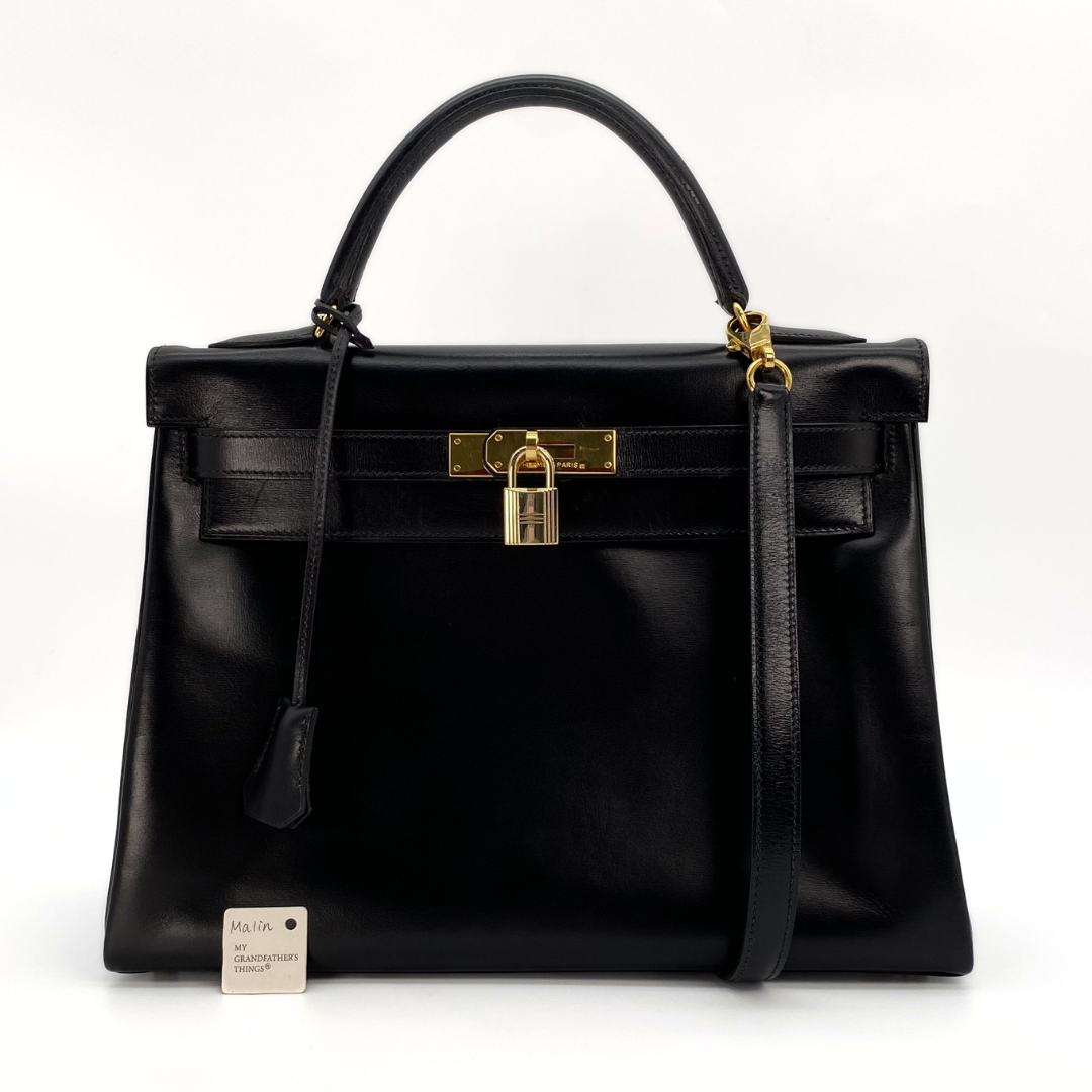 Malin, 1966 Kely 32 Retourne Black Boxcalf with stamp V