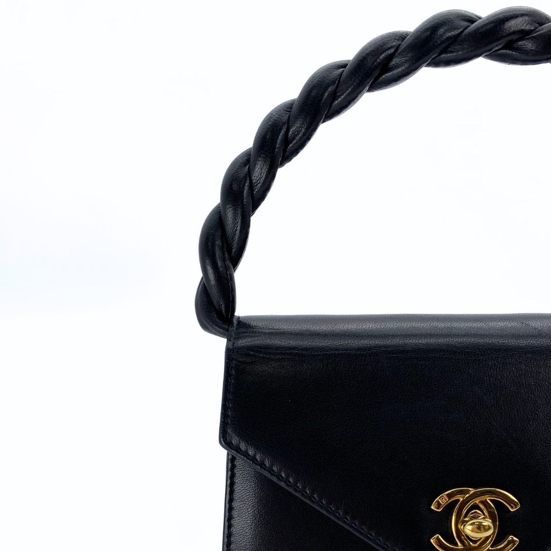 Makoto, 4 Series Turnlock Black Lambskin with seal and card