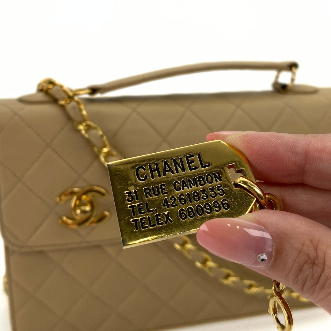 Yejun, 1 Series Double Turn Lock Beige Lambskin with seal and card