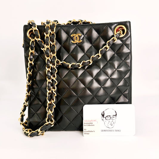 Shermaine, Vintage Authentic Chanel 0 series chain tote black lambskin with seal