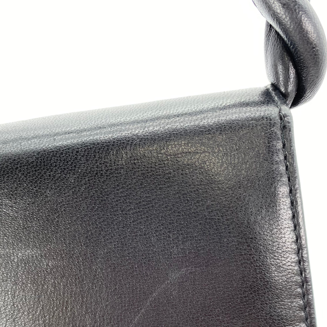 Makoto, 4 Series Turnlock Black Lambskin with seal and card