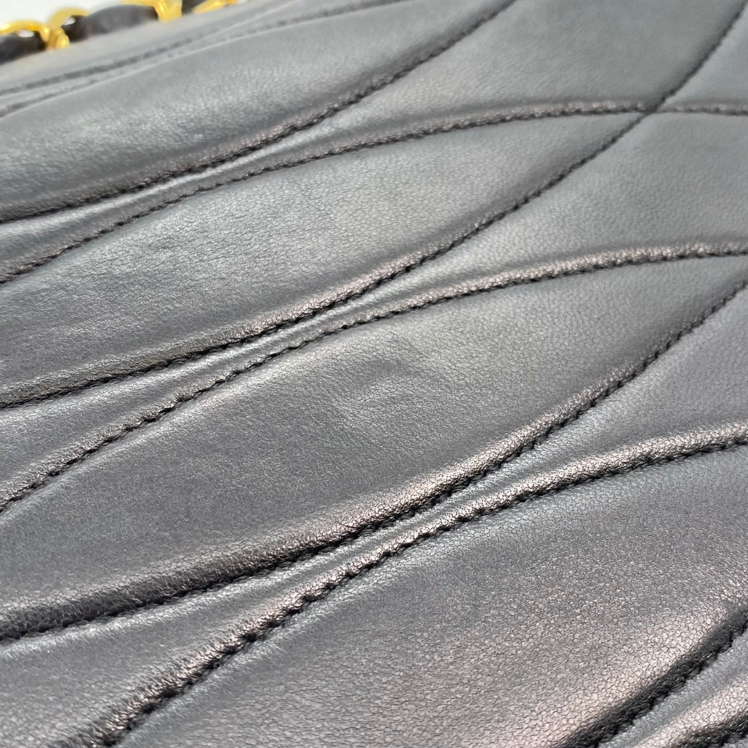 Xarena, 2 Series Curved Stitch Black Lambskin with seal and card