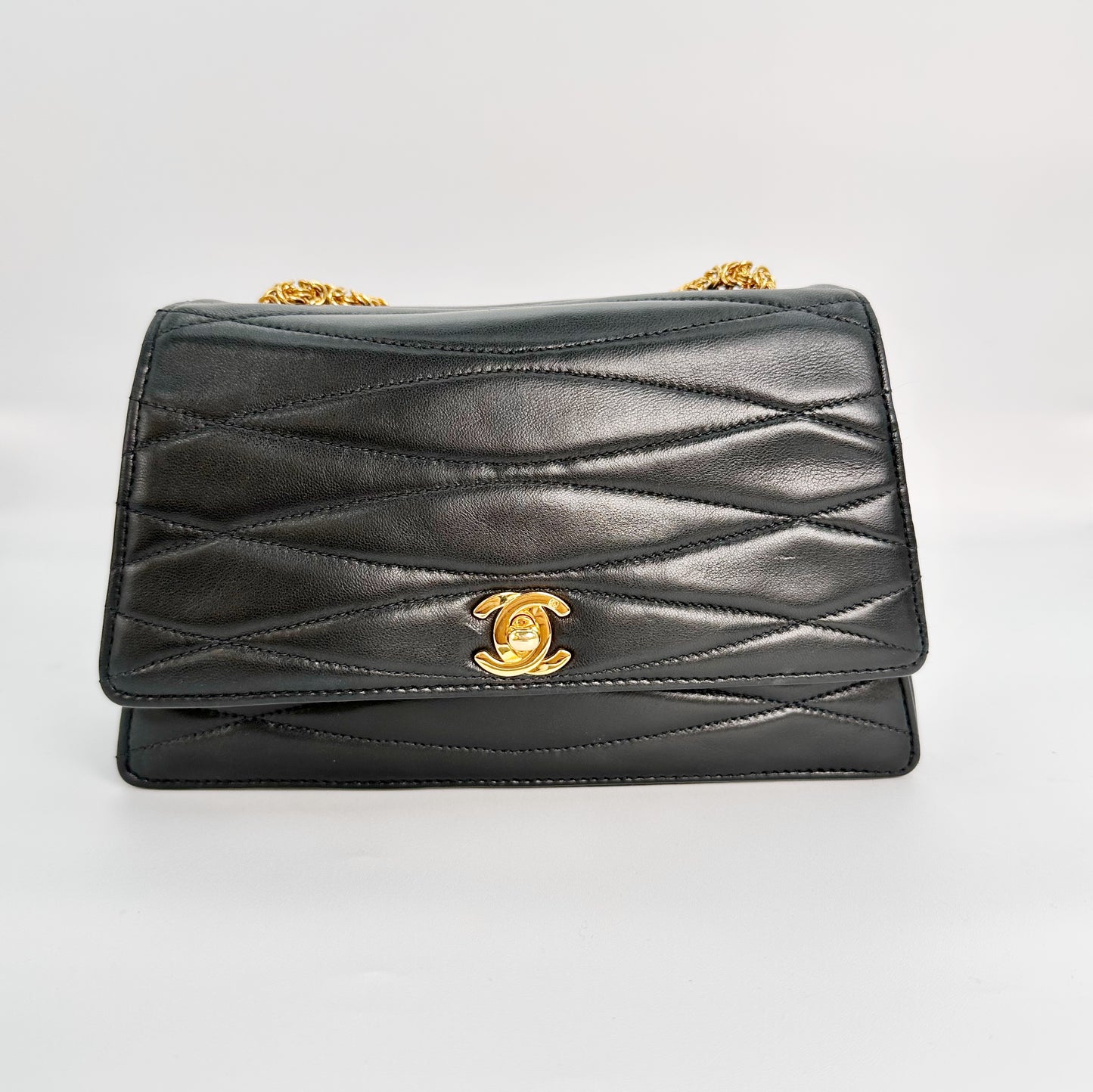 Chizue, Vintage Authentic Chanel 2 series wave stitch black lambskin with seal and card